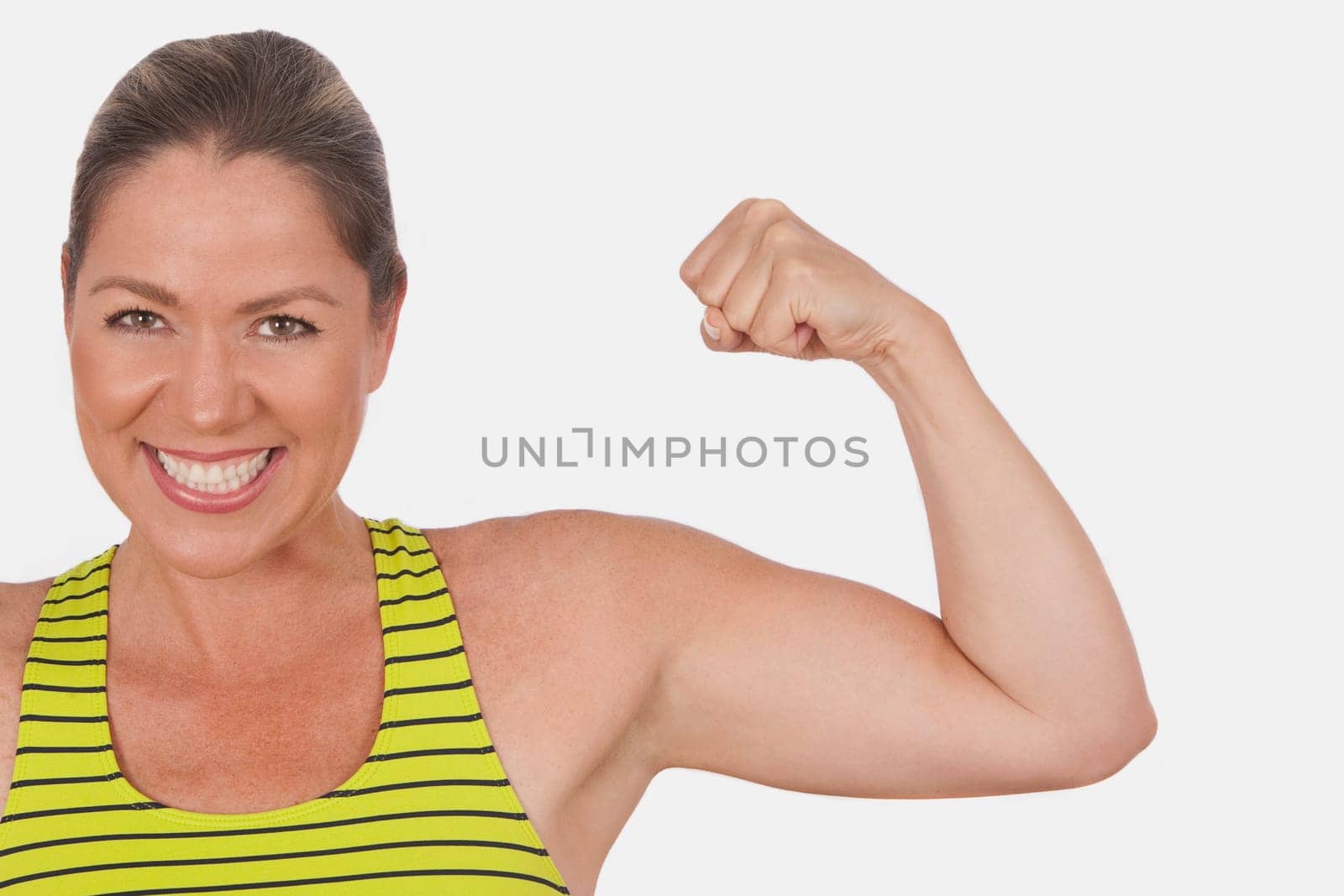 Portrait of a woman flexing muscles