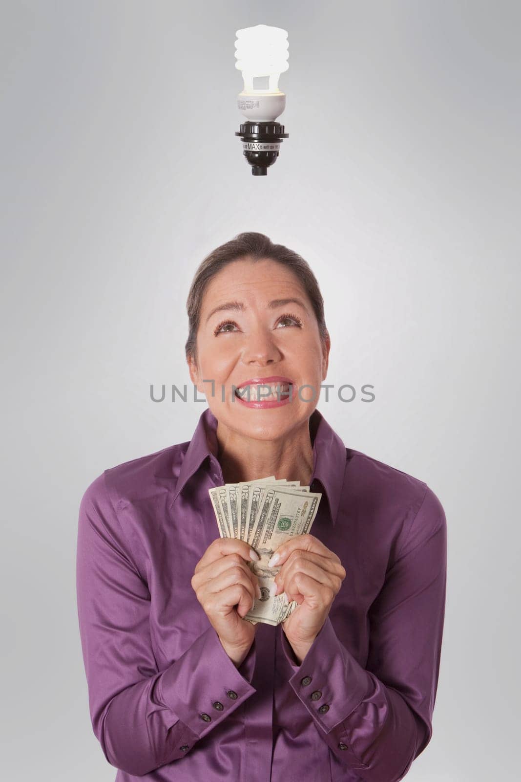 Woman holding currency notes