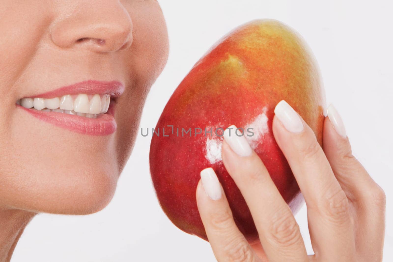 Woman holding a mango