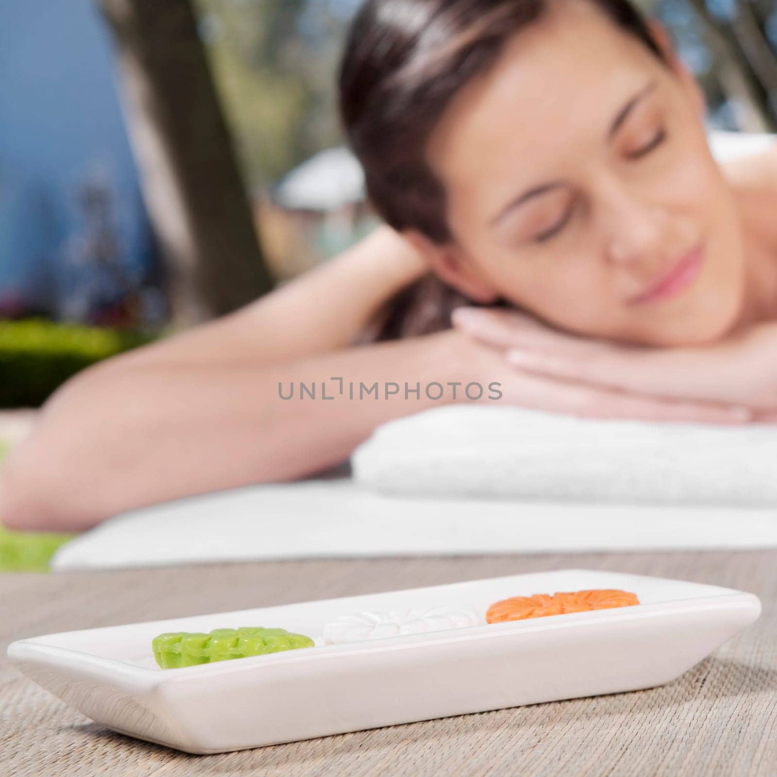 Woman lying on a massage table