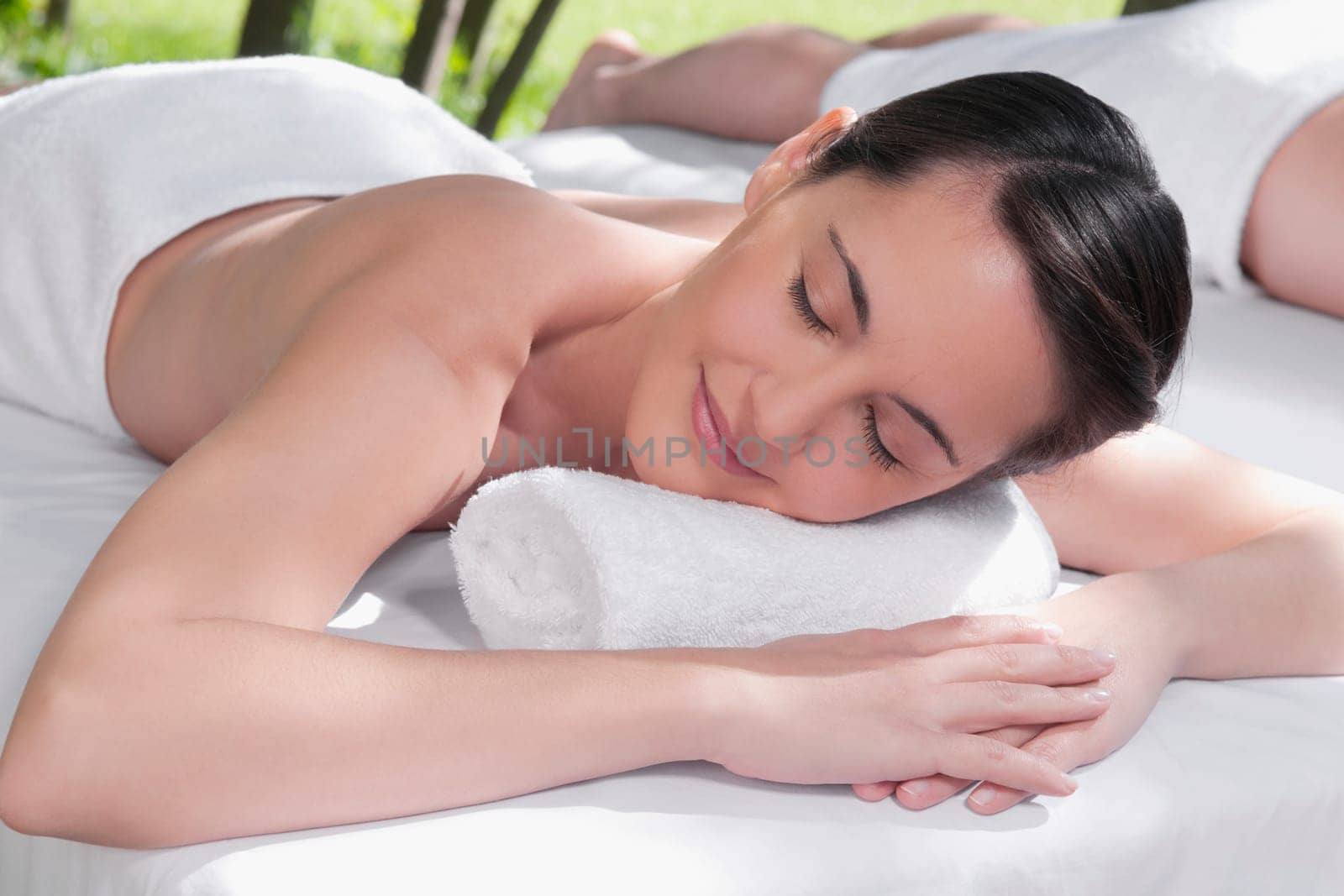 Woman lying on a massage table