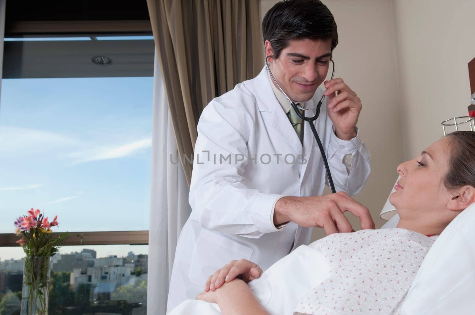 Doctor examining a woman
