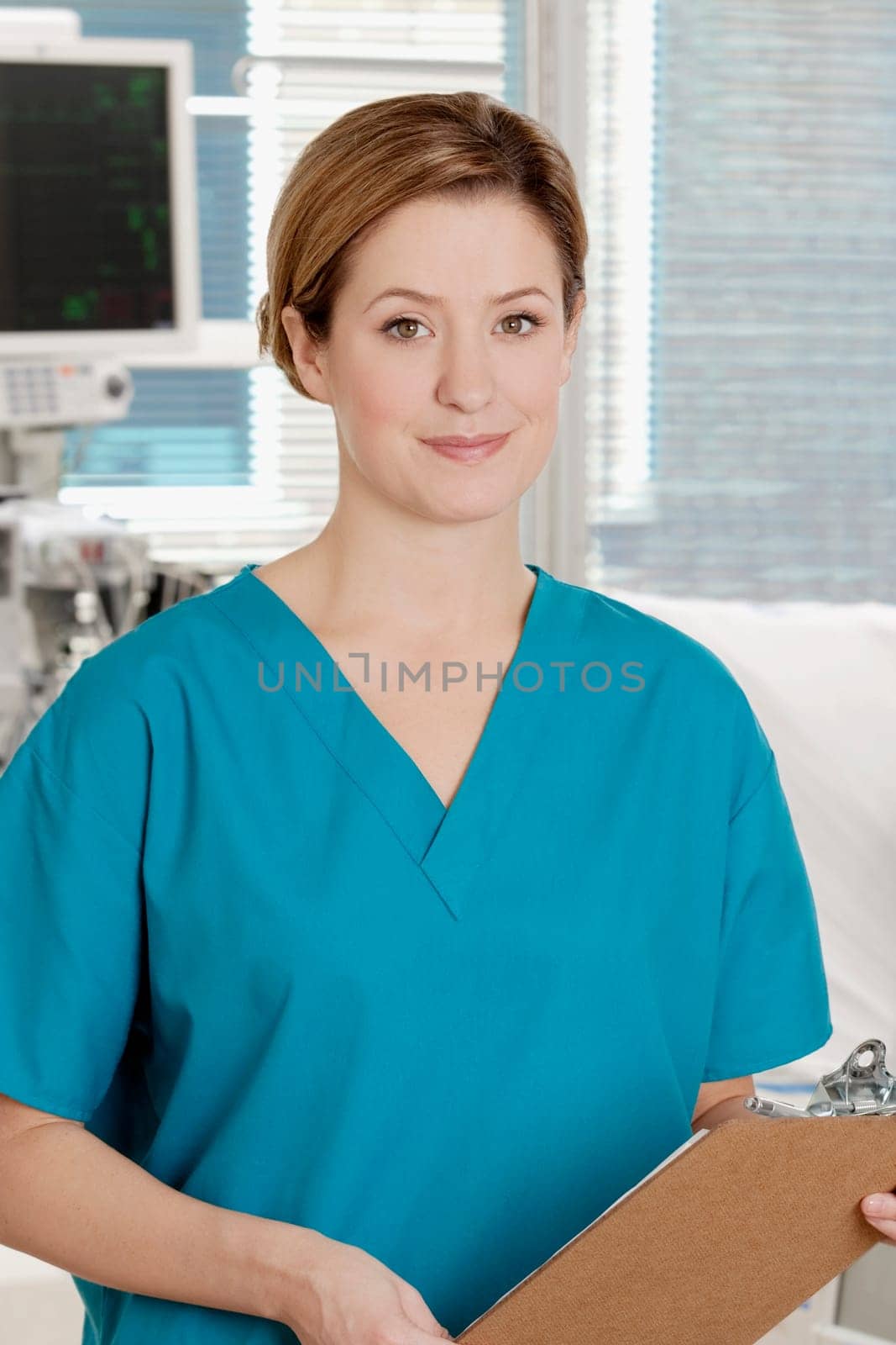 Female doctor holding a clipboard