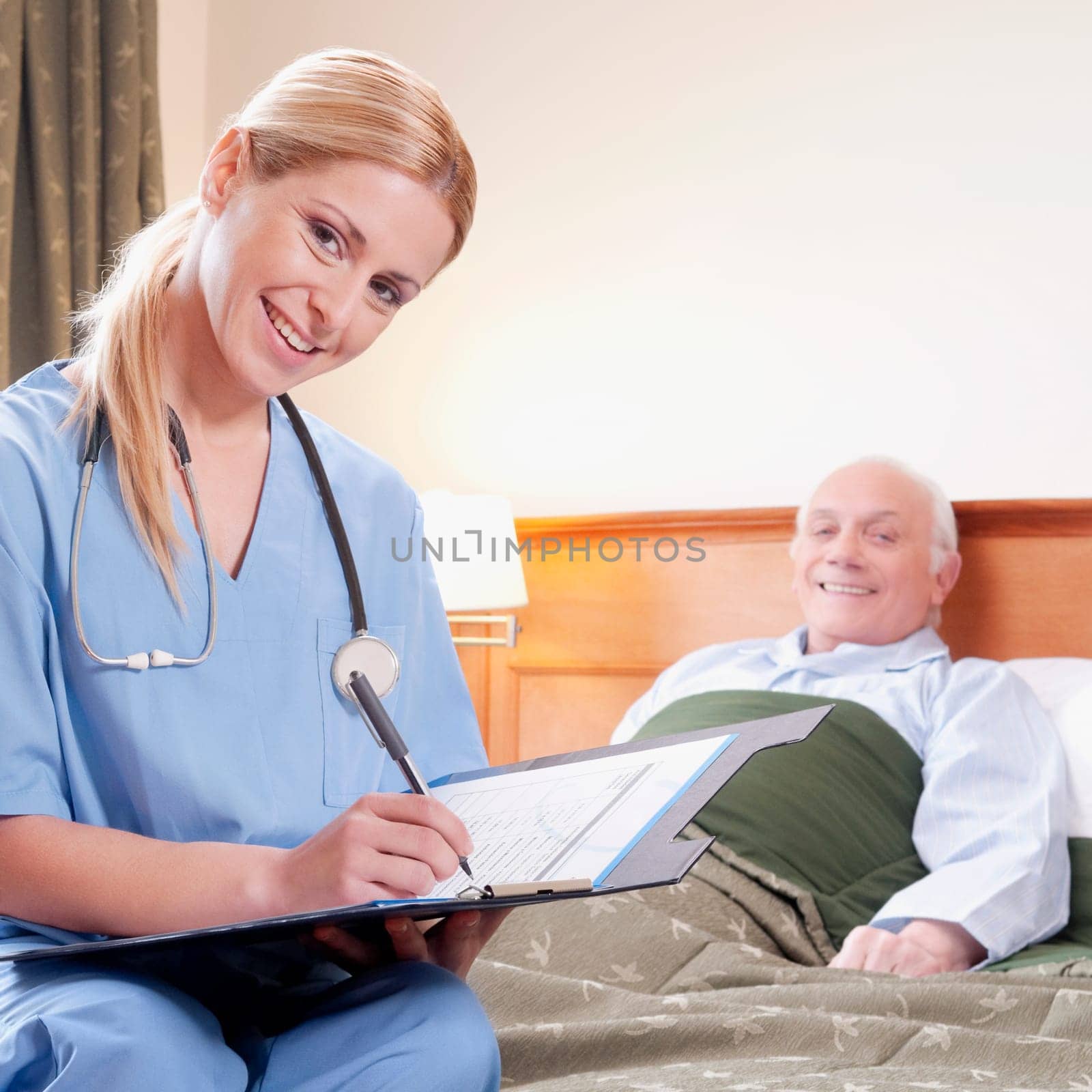 Female nurse preparing the medical report of a patient