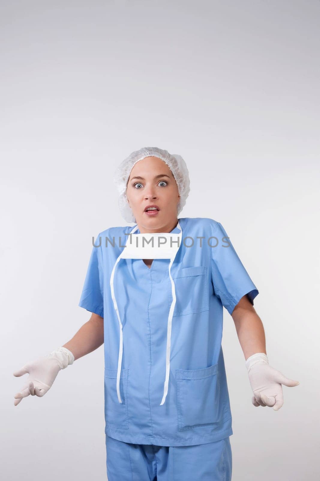 Portrait of a female surgeon gesturing