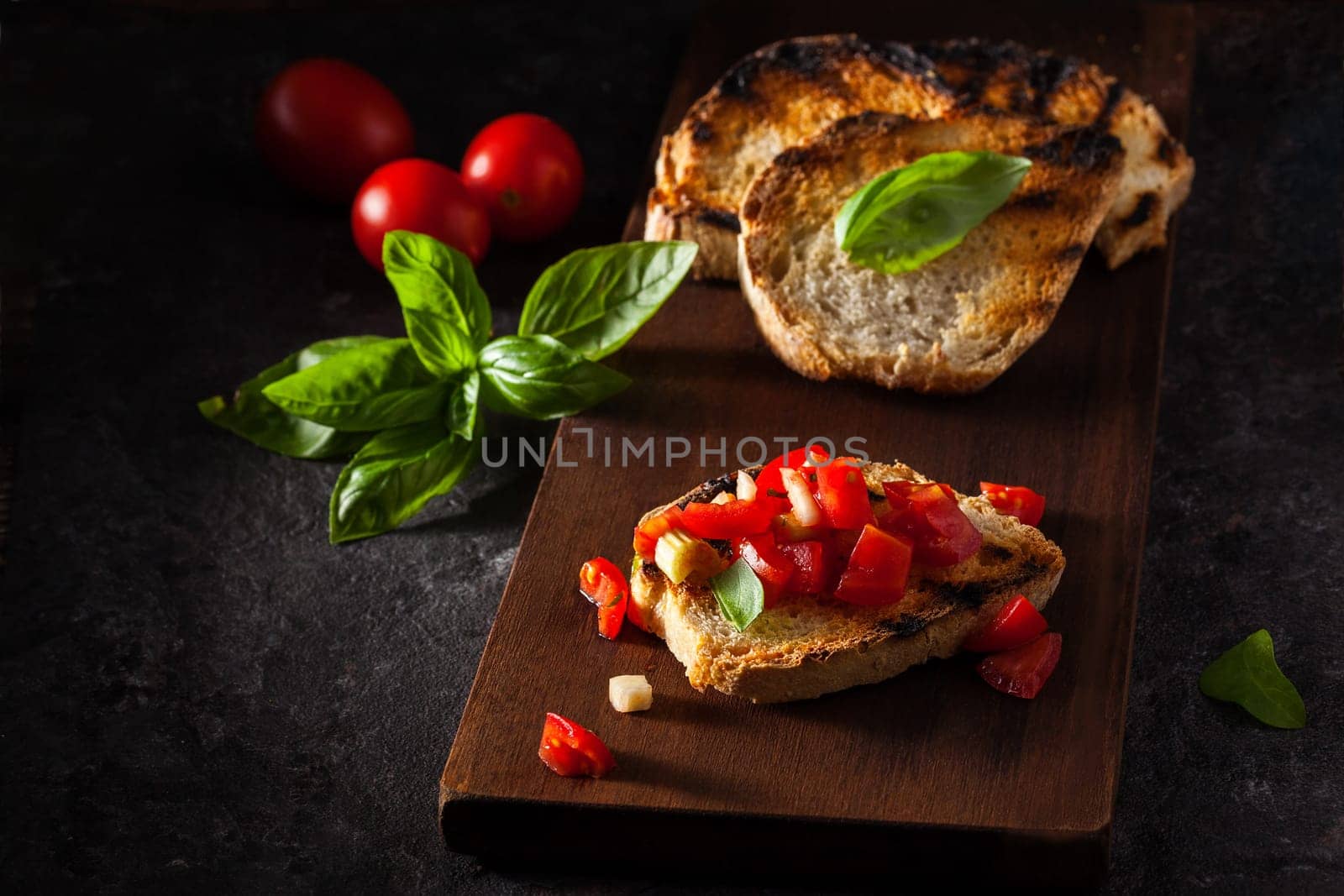 Italian food. Bruschetta with tomatoes and basil.