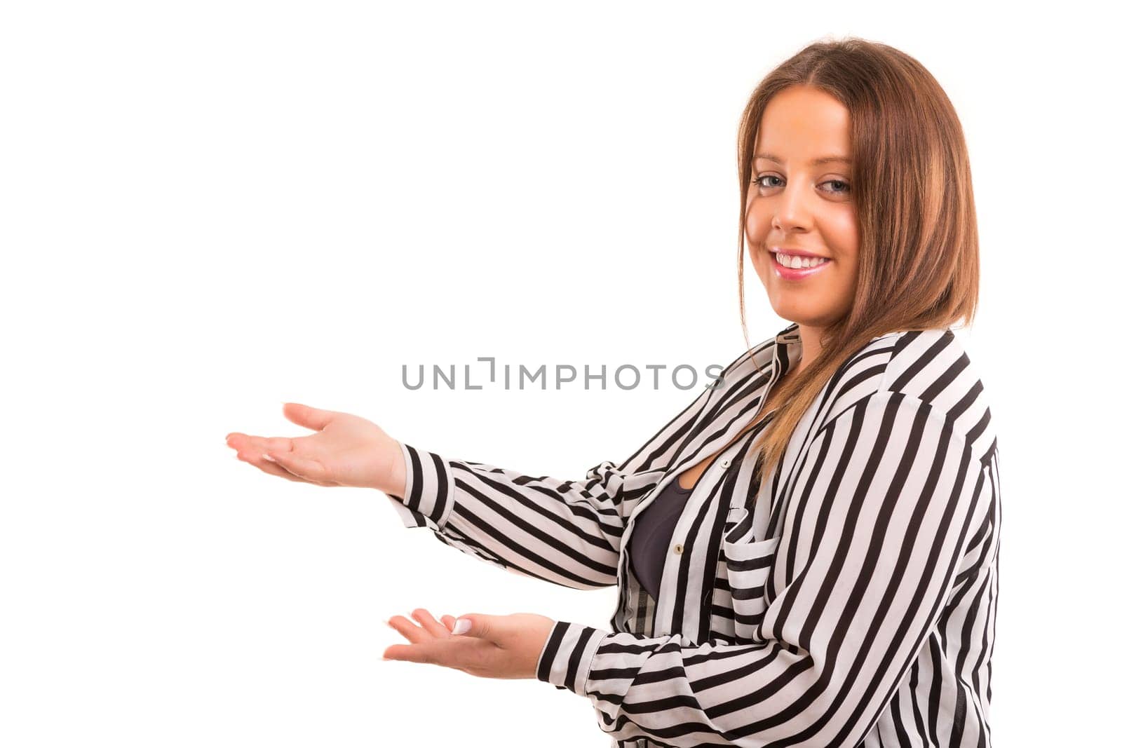 Young large beautiful woman presenting your product, isolated over white background