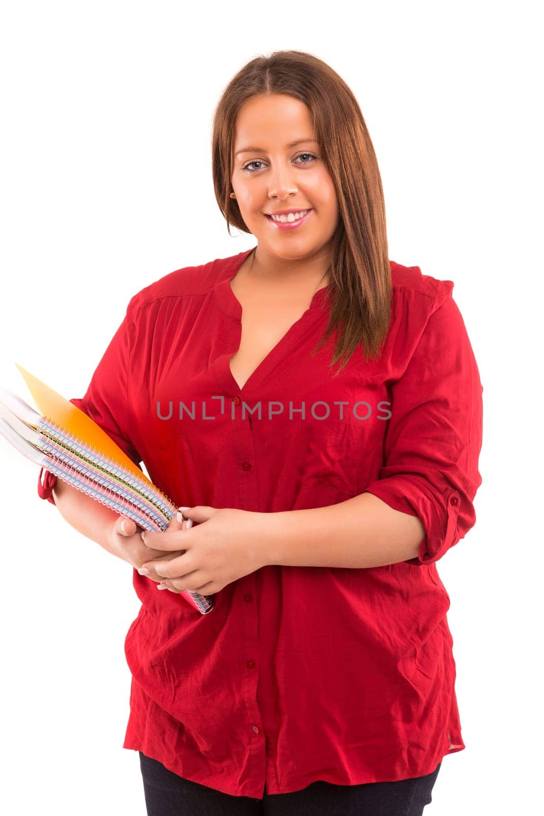 A beautiful large student woman, posing isolated over white background