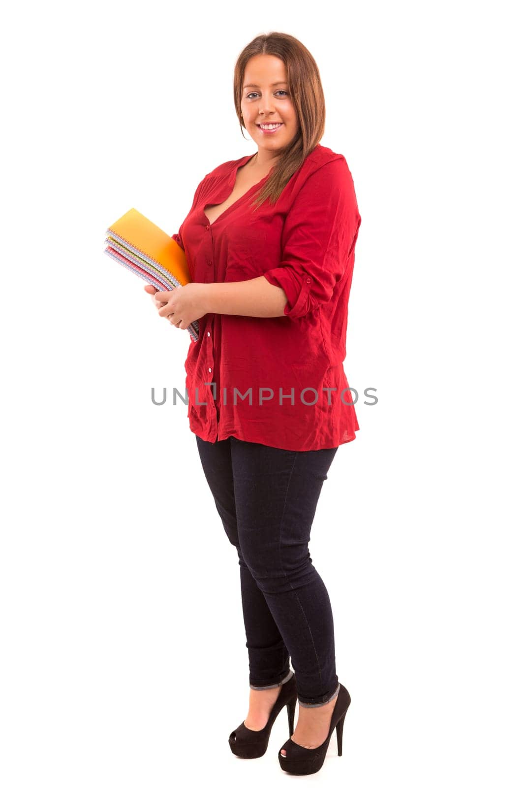A beautiful large student woman, posing isolated over white background