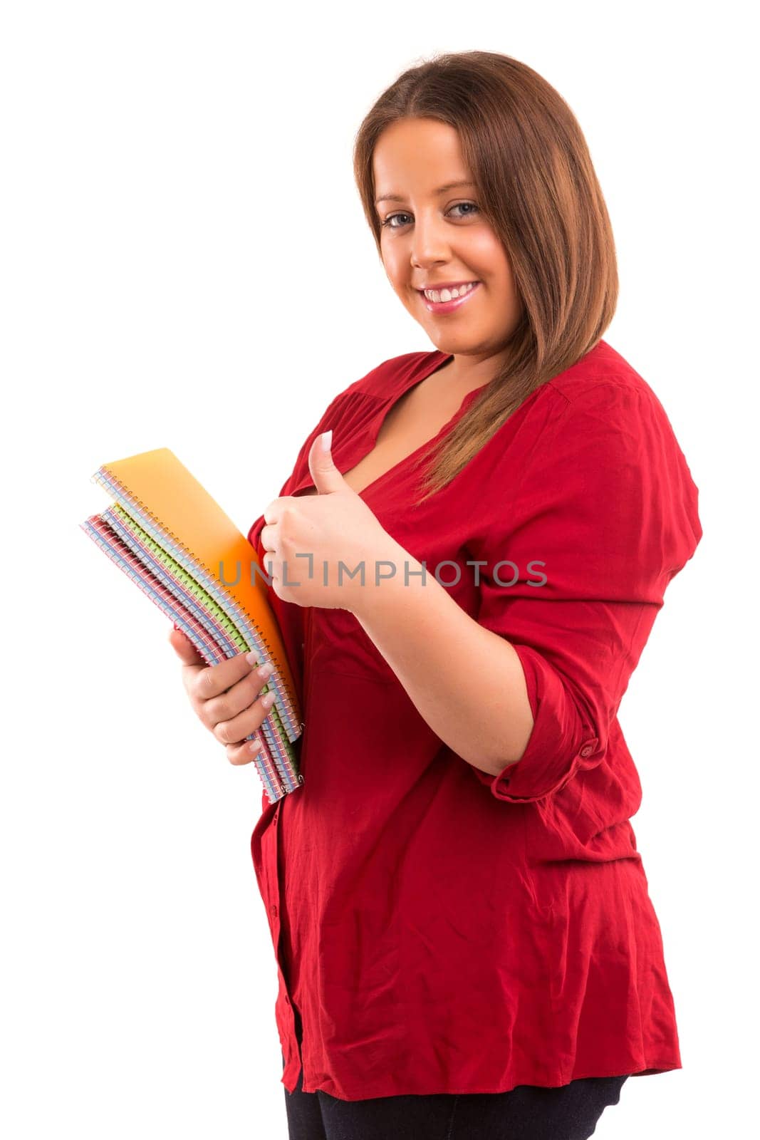 A beautiful large student woman, posing isolated over white background