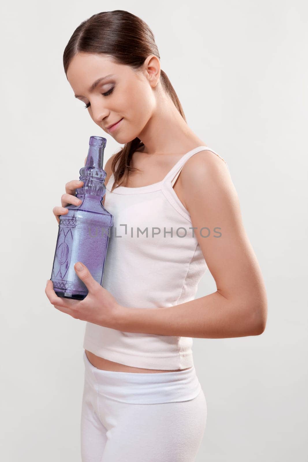 Woman smelling bath crystals