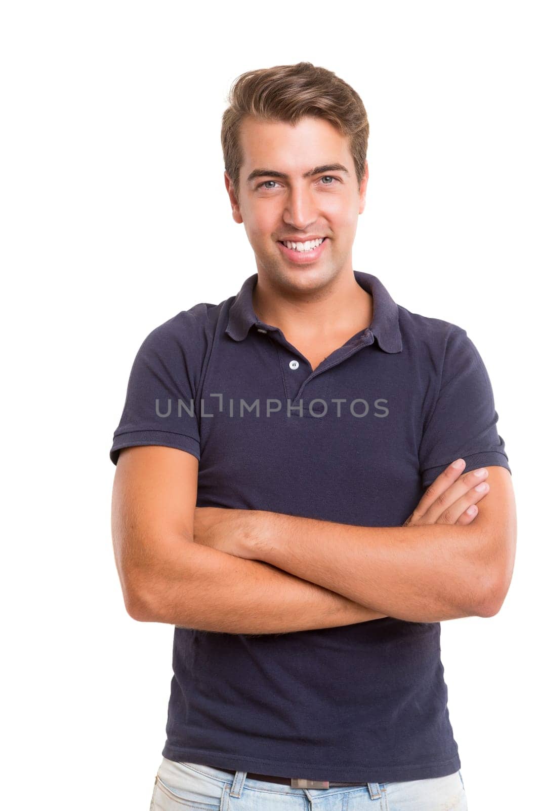 Studio picture of a young and handsome man posing isolated