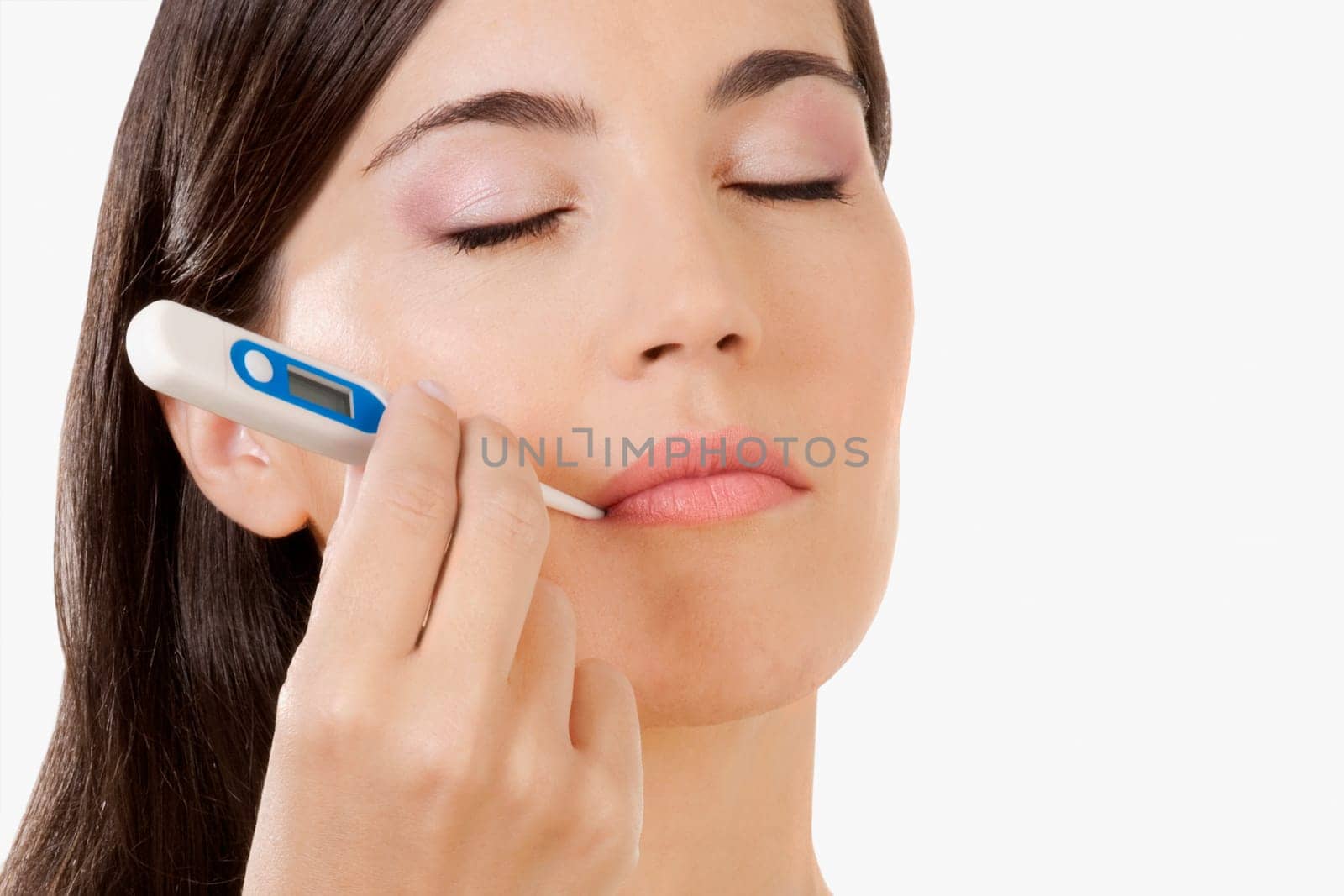 Woman taking her temperature