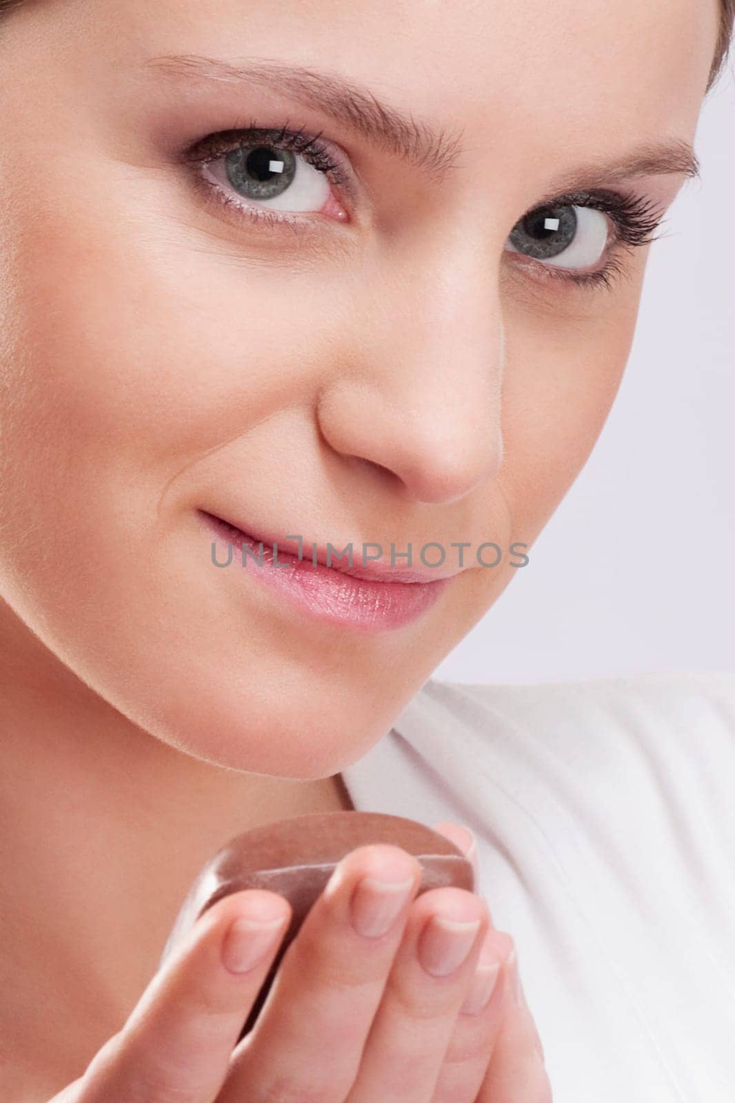 Woman holding a bar of soap