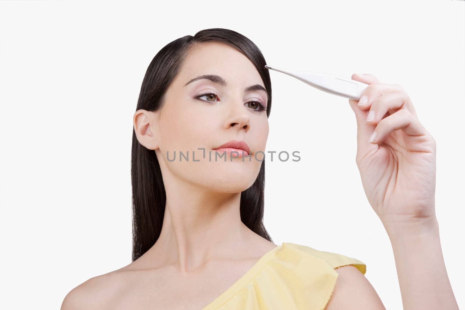 Woman reading a thermometer