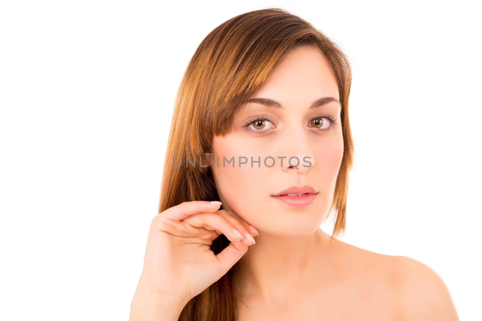 Beautiful young woman with a perfect skin, isolated over white background