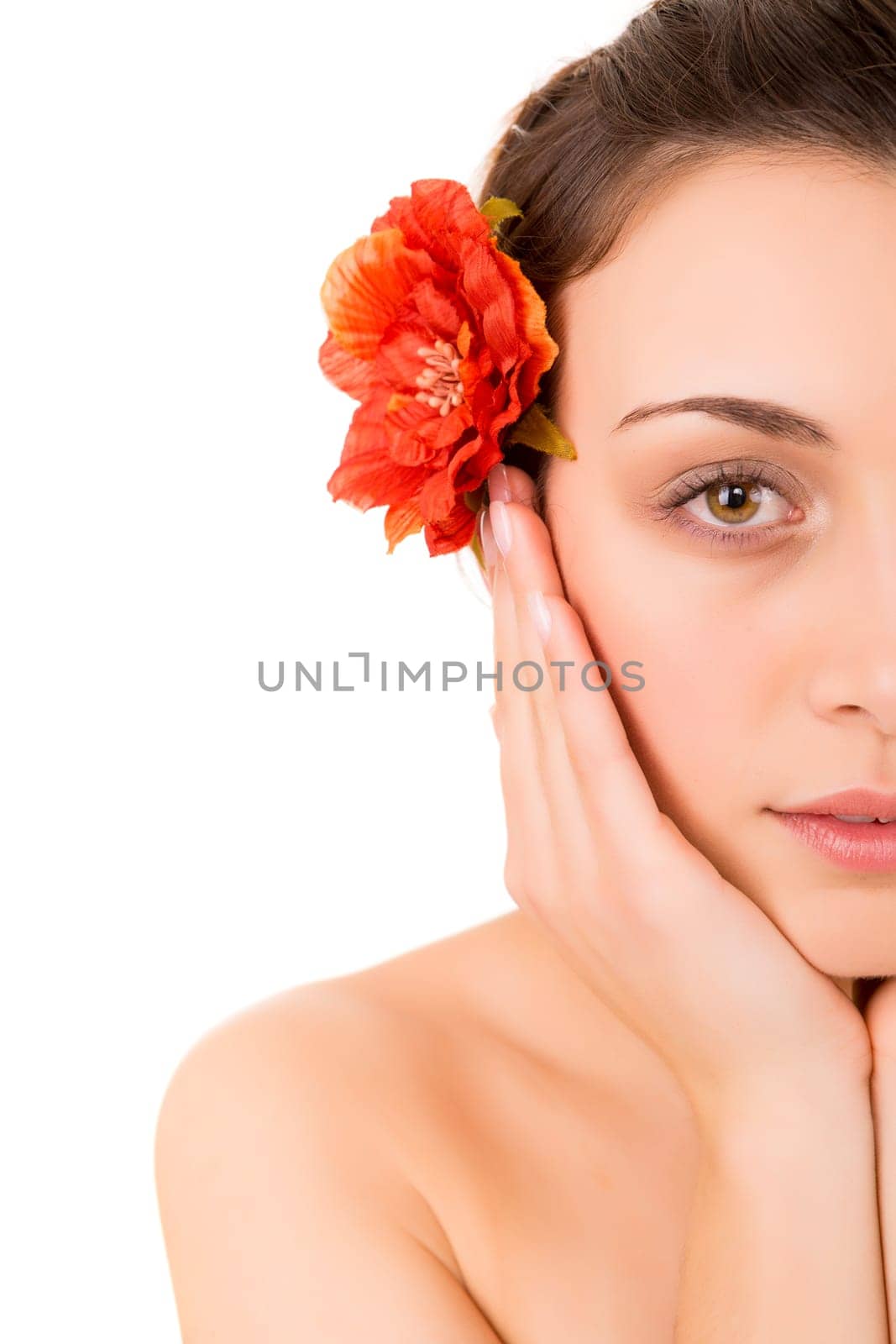 Beautiful young woman with a perfect skin, isolated over white background