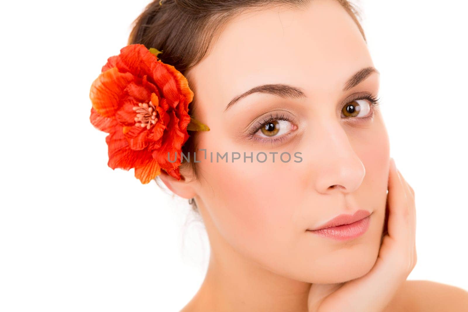 Beautiful young woman with a perfect skin, isolated over white background
