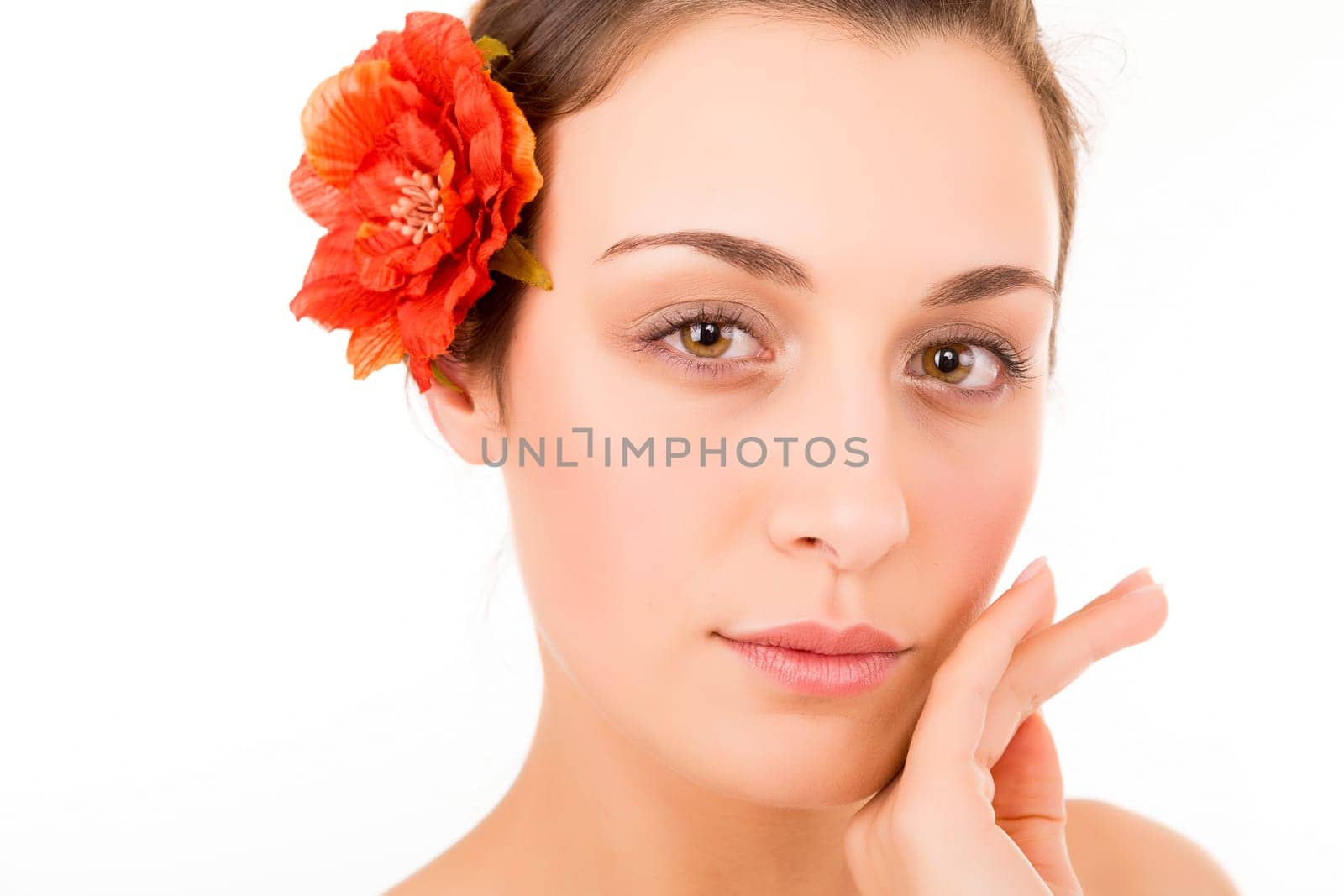 Beautiful young woman with a perfect skin, isolated over white background