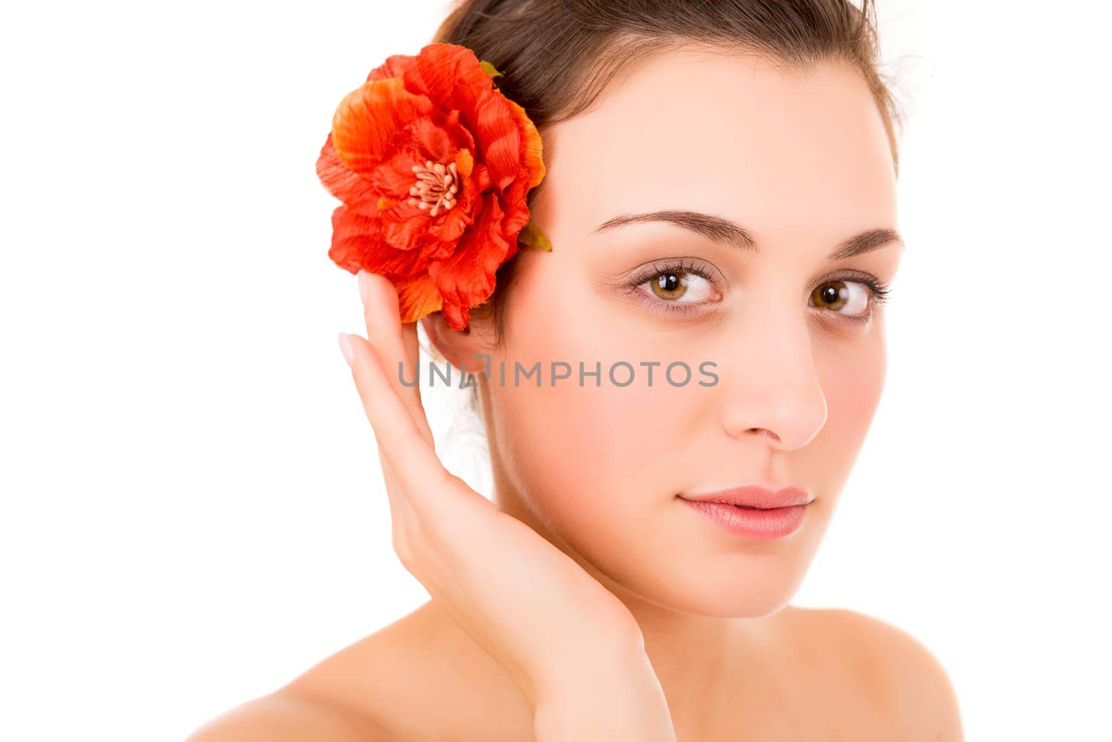 Beautiful young woman with a perfect skin, isolated over white background