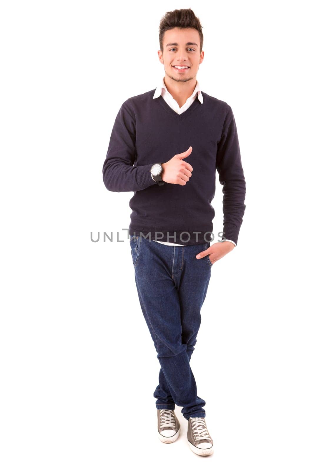 Studio picture of a young and handsome man posing isolated