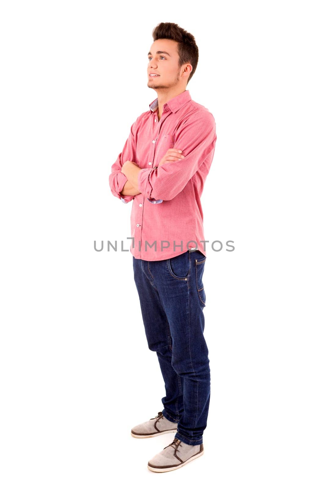 Studio picture of a young and handsome man posing isolated