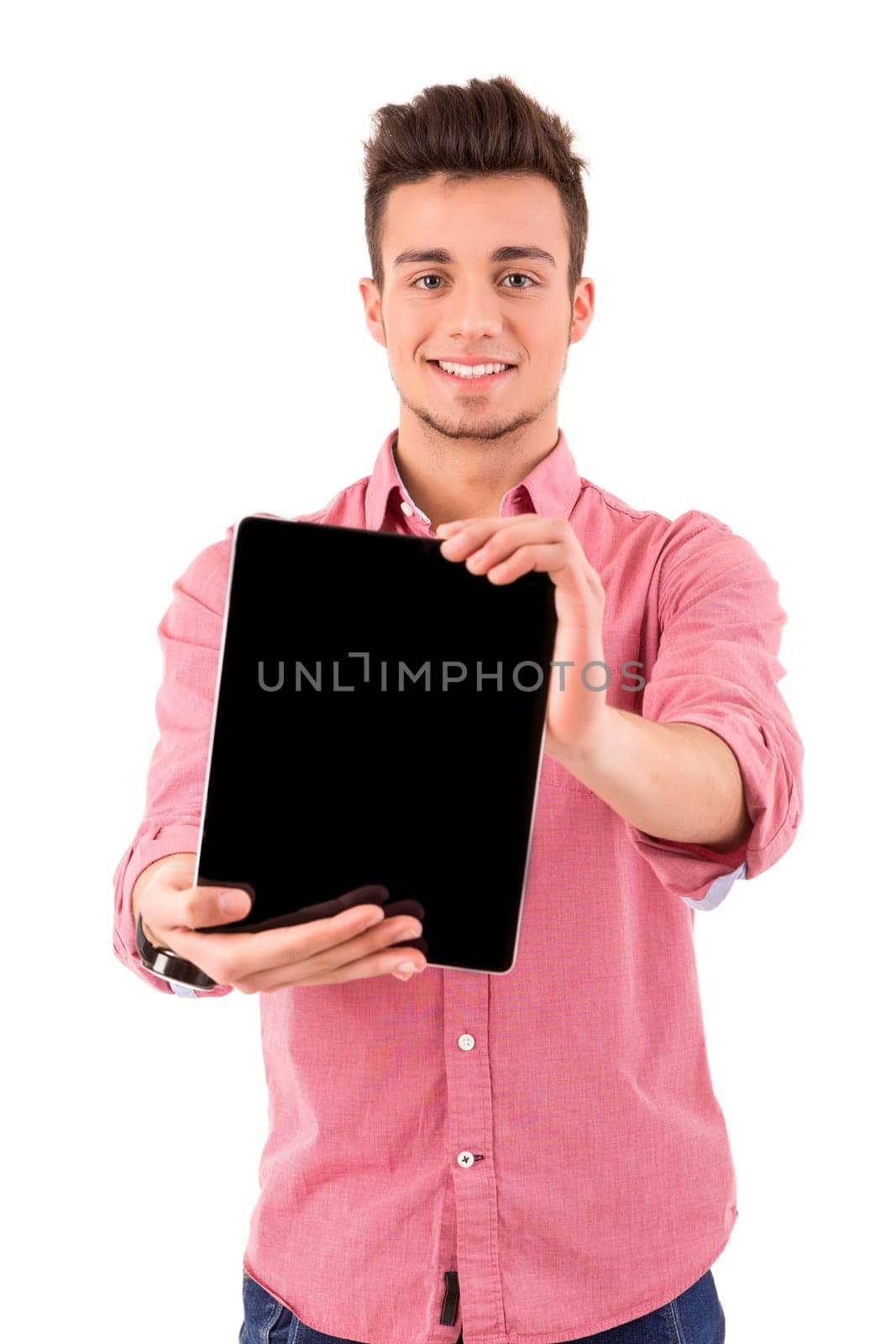 Happy young man presenting your product in a tablet computer