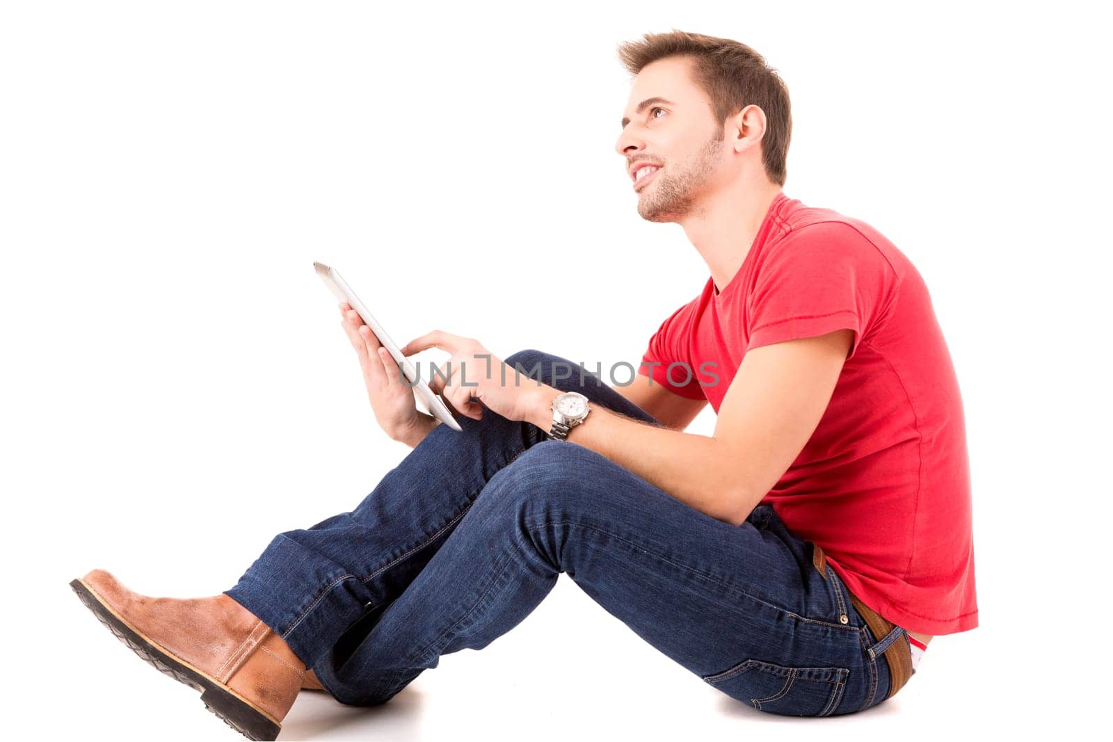 Young happy student working with a new digital tablet computer, isolated