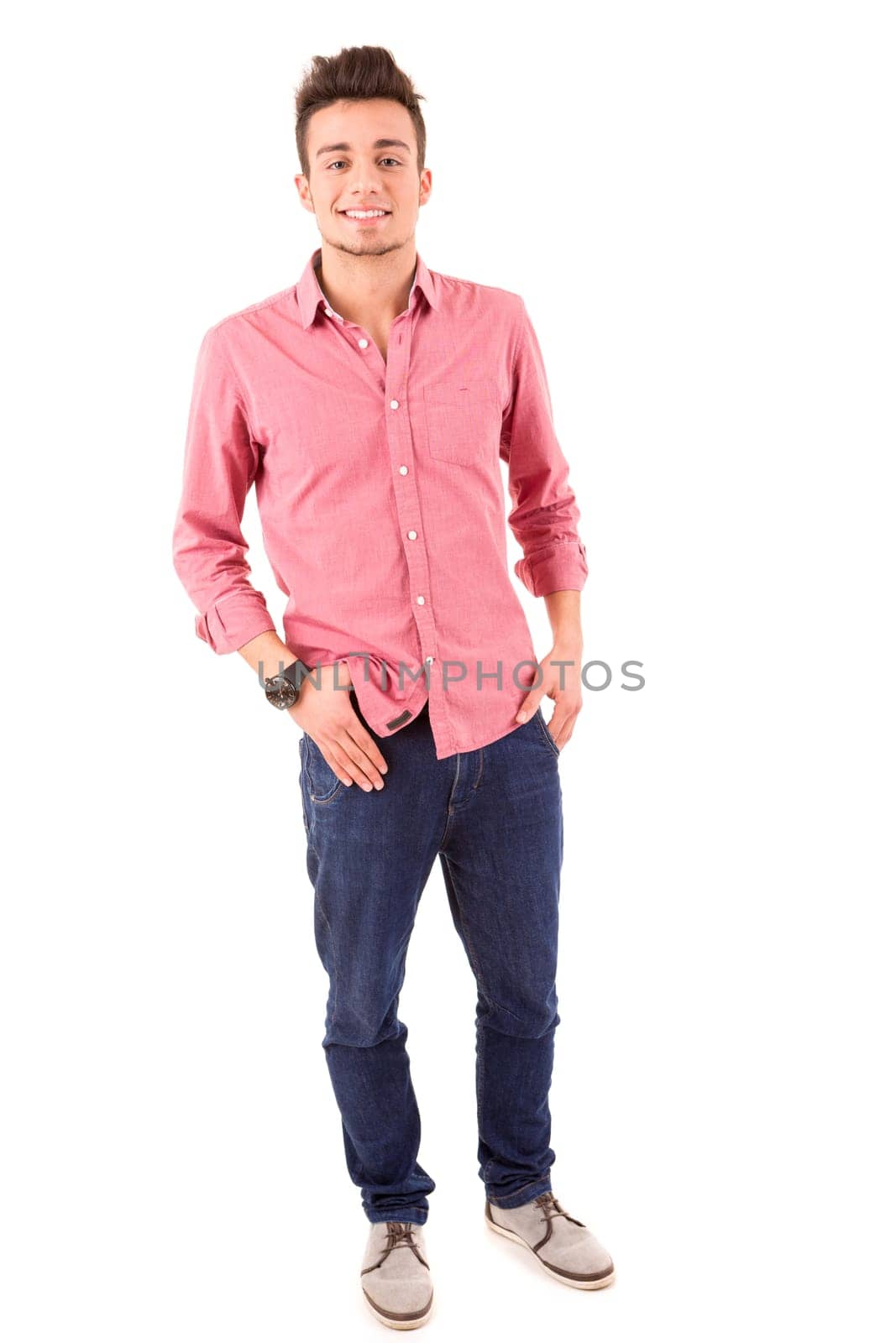 Studio picture of a young and handsome man posing isolated