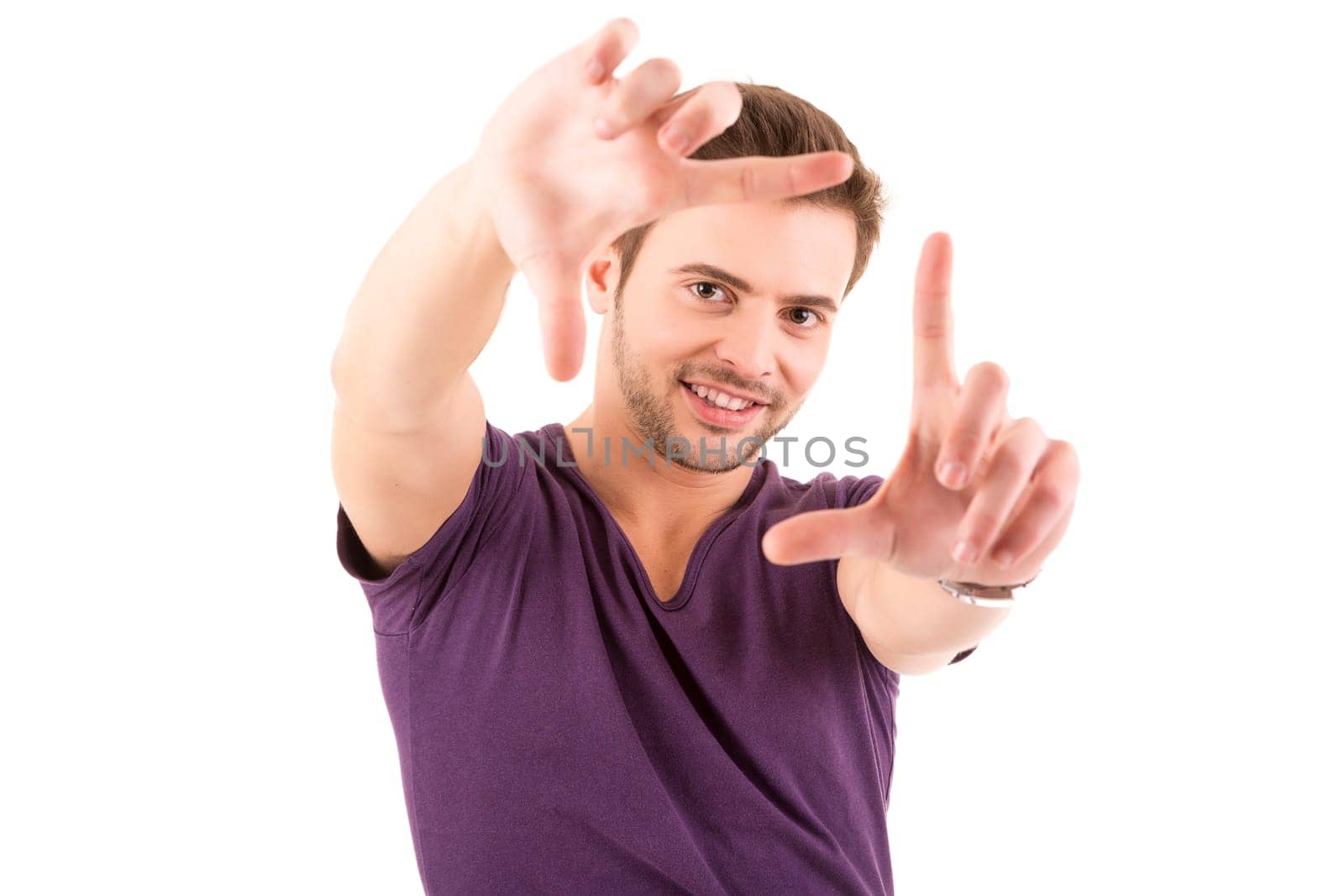 Studio picture of a young and handsome man posing isolated
