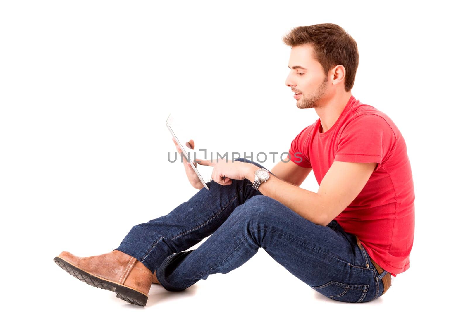 Young happy student working with a new digital tablet computer, isolated