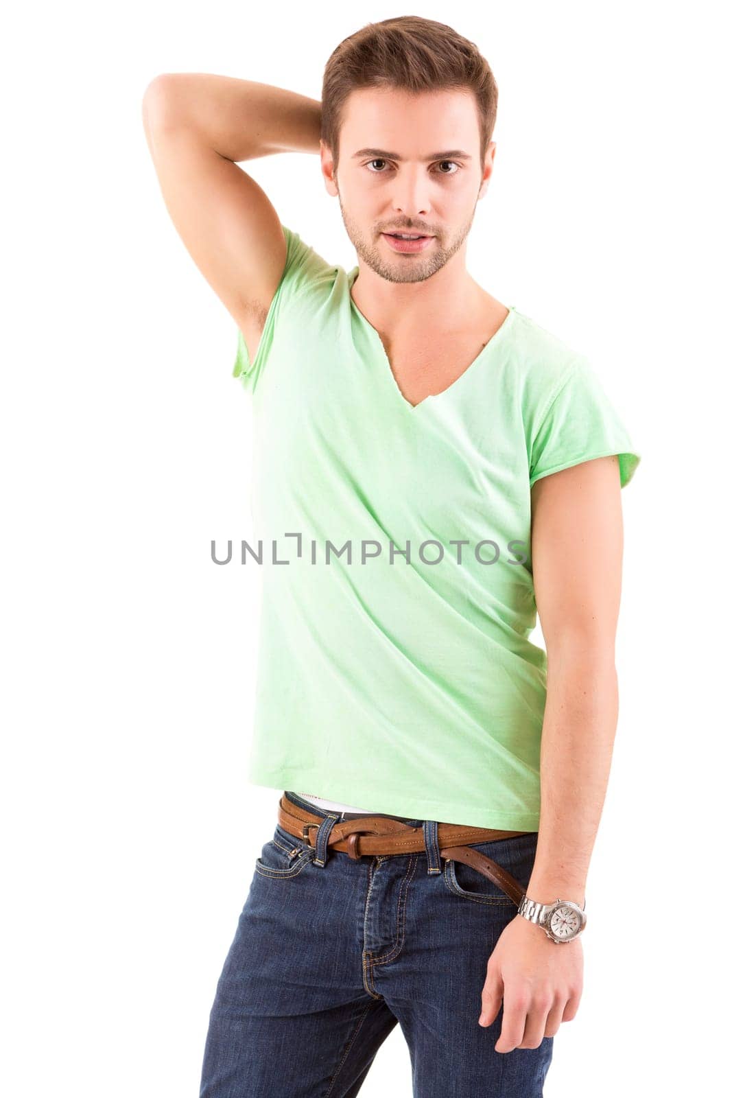 Studio picture of a young and handsome man posing isolated