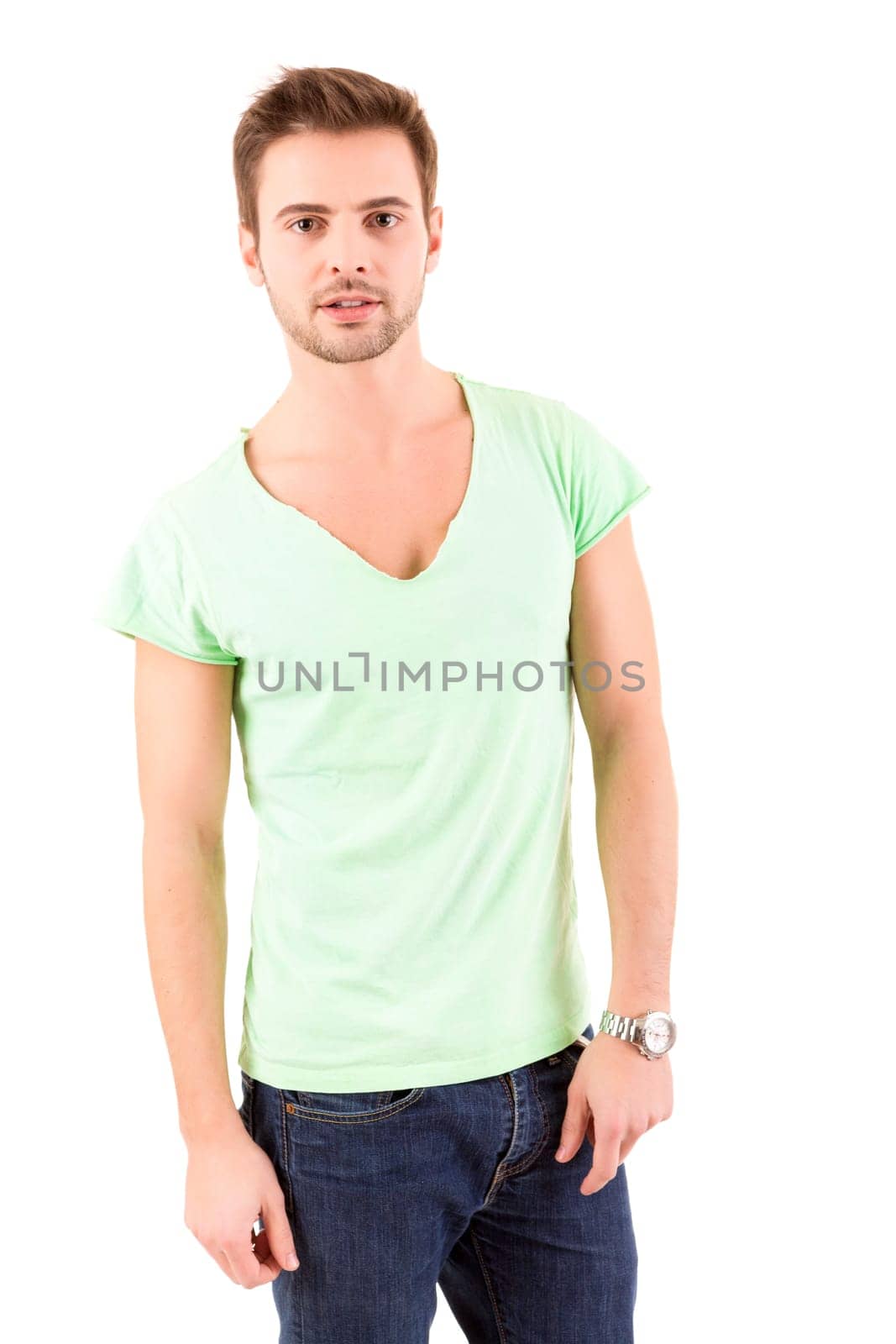 Studio picture of a young and handsome man posing isolated