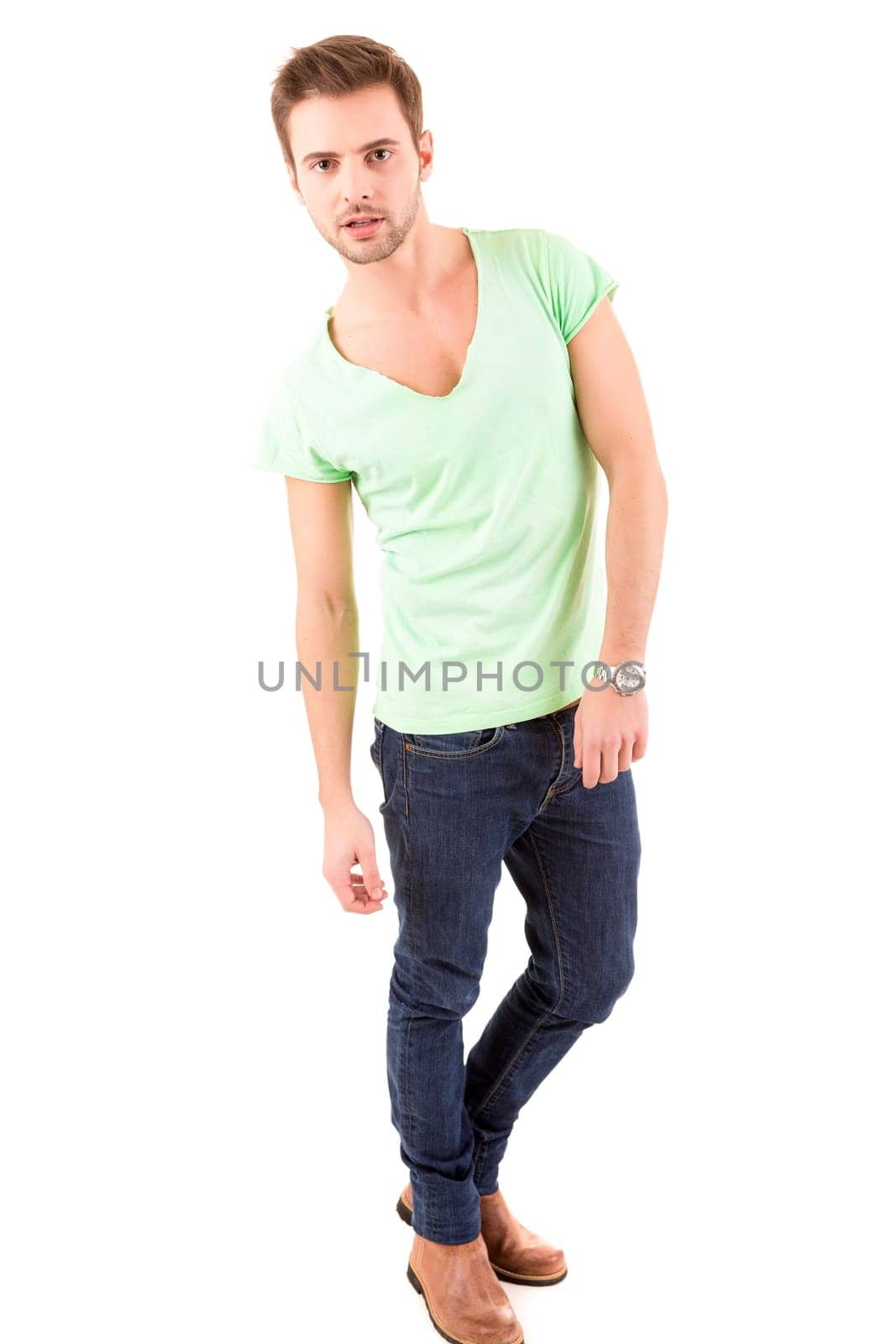 Studio picture of a young and handsome man posing isolated