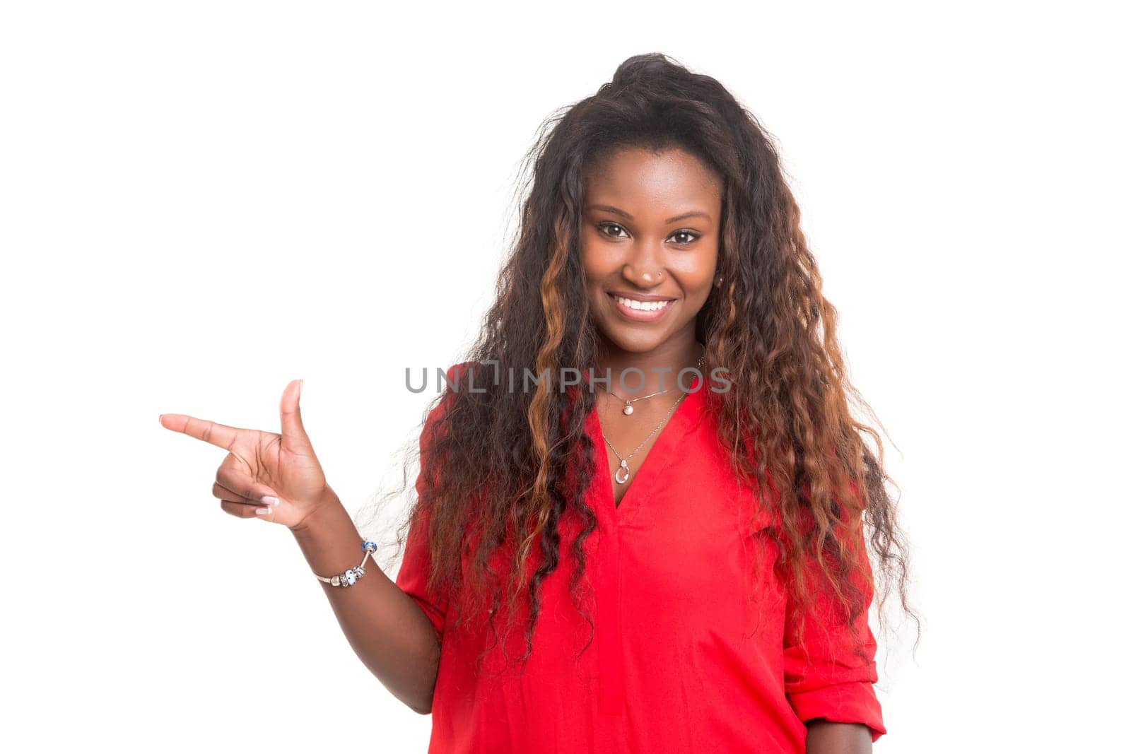 Young beautiful african woman presenting your product, isolated over white background