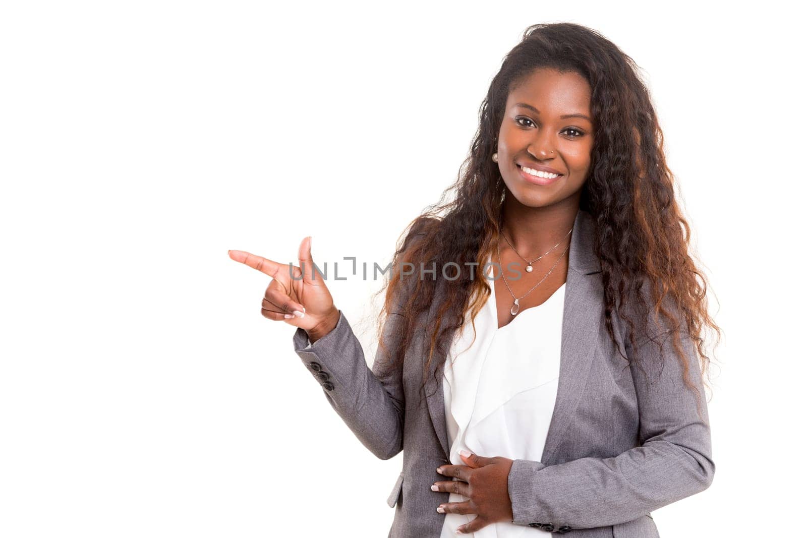 Young beautiful african woman presenting your product, isolated over white background