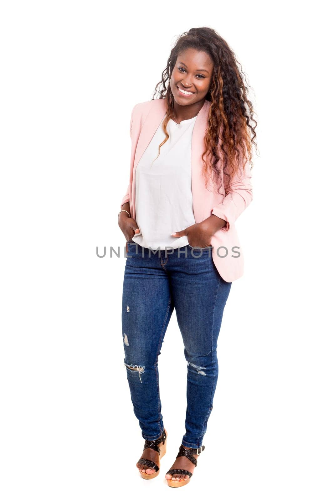 Beautiful young african woman posing isolated over white