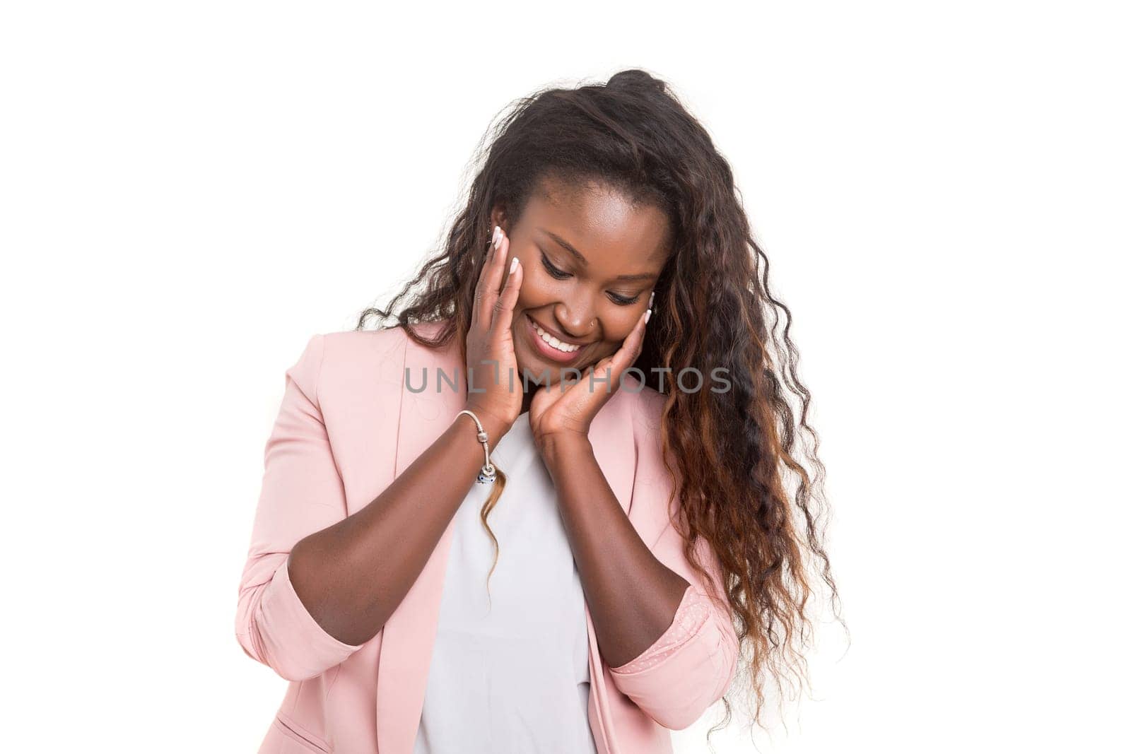 Beautiful young african woman posing isolated over white