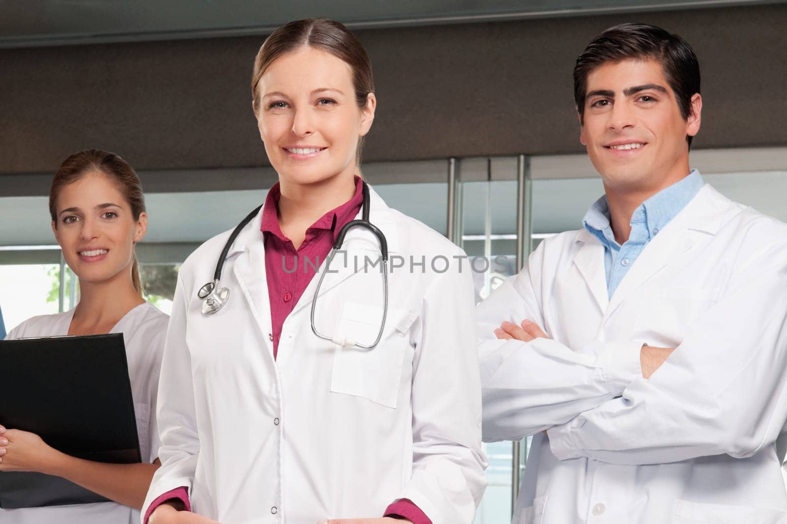 Three doctors standing together