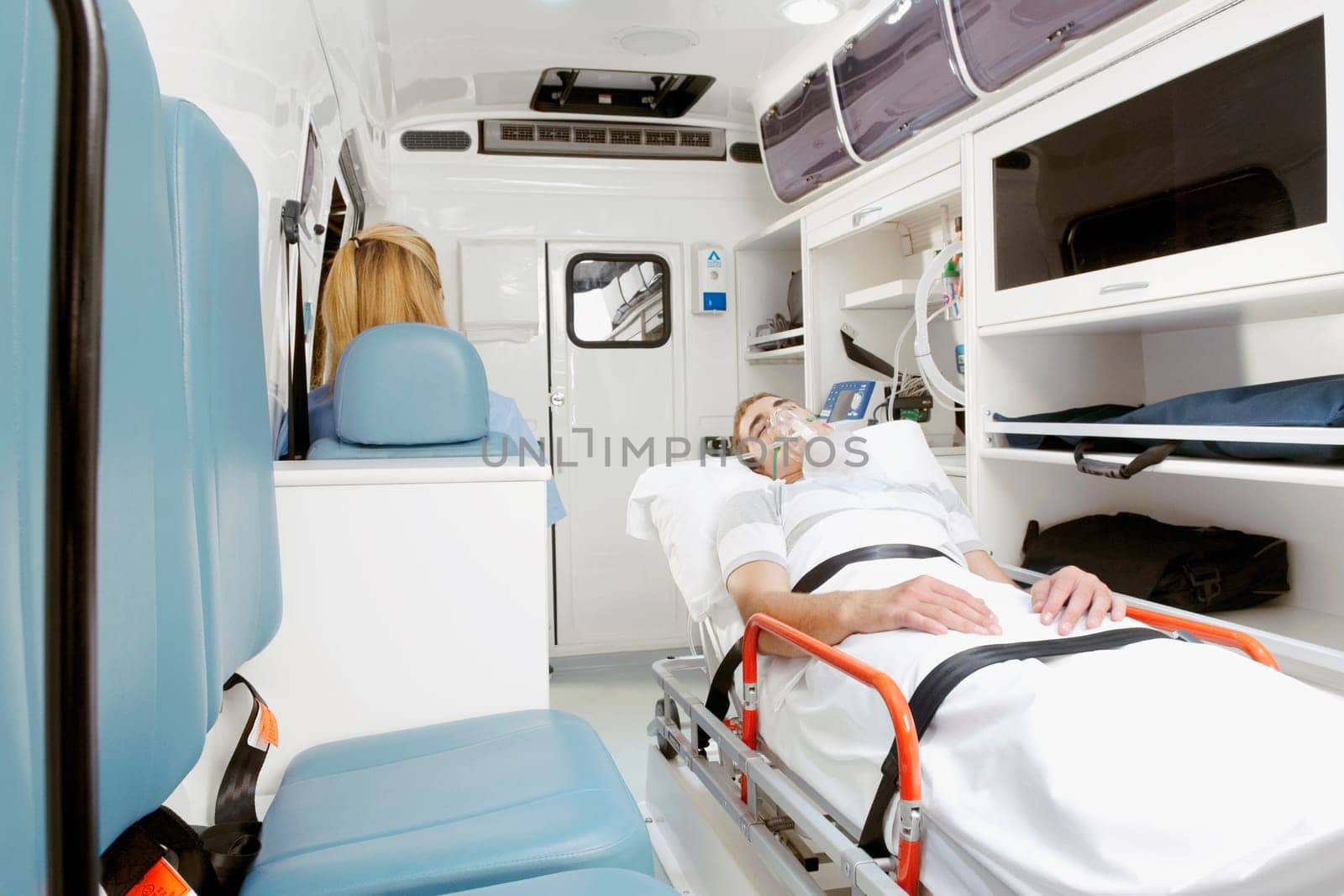 Patient lying in an ambulance