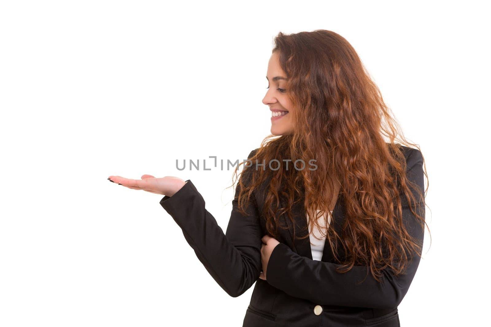 Young beautiful woman presenting your product, isolated over white background