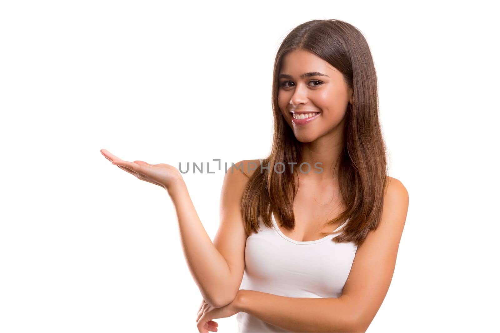 Young beautiful woman presenting your product, isolated over white background