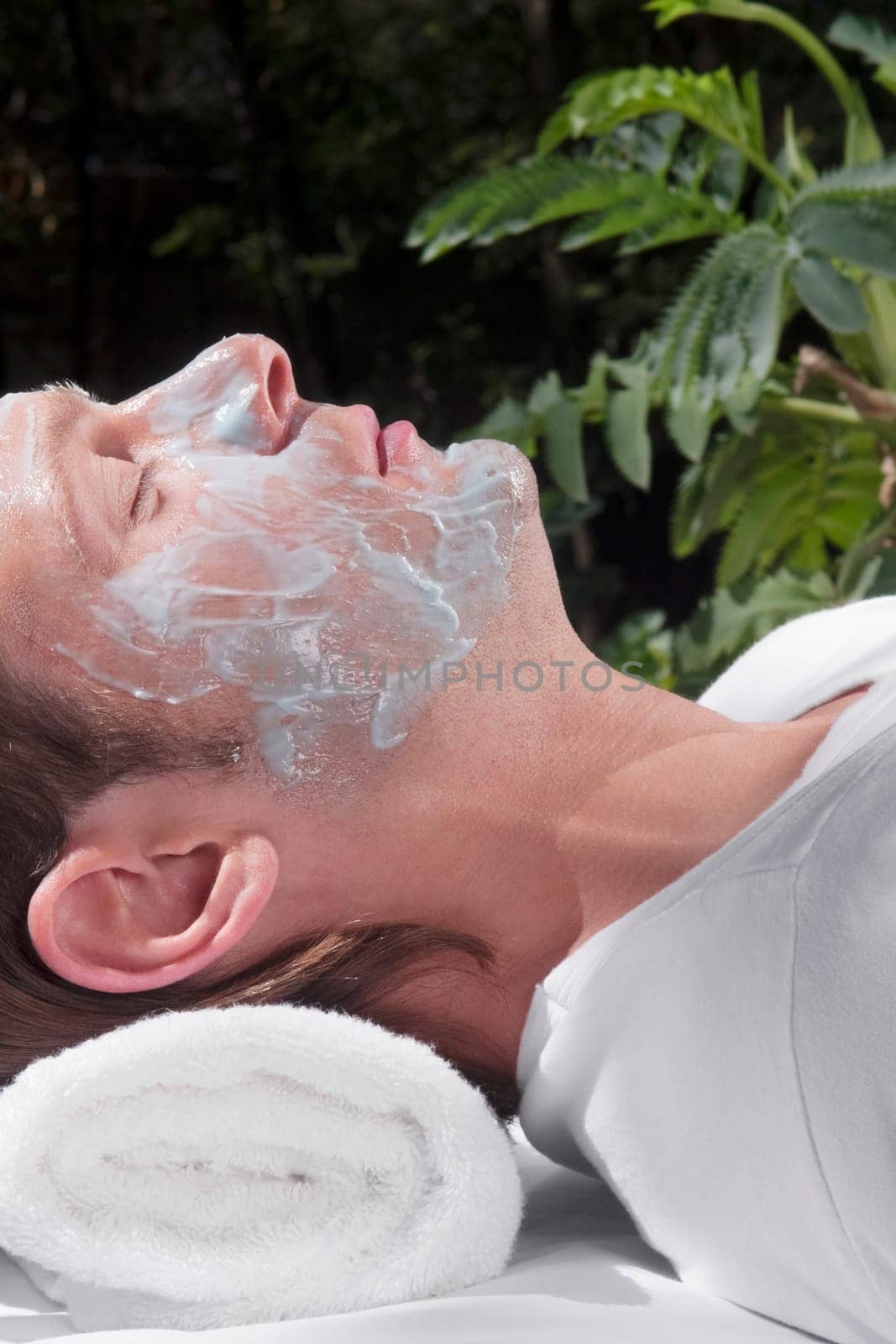Close_up of a man with facial mask