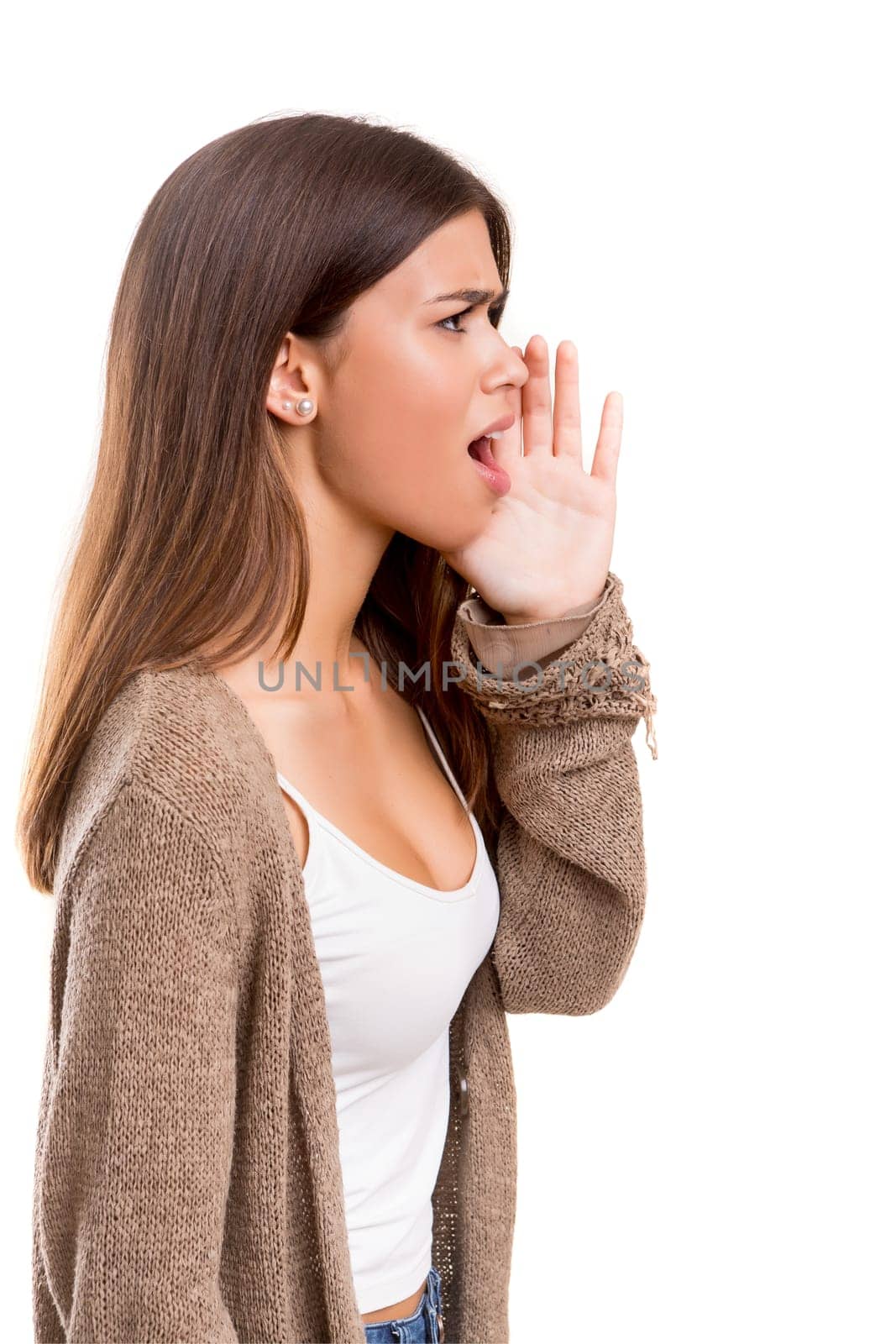 Very happy woman screaming at someone, isolated over a white background