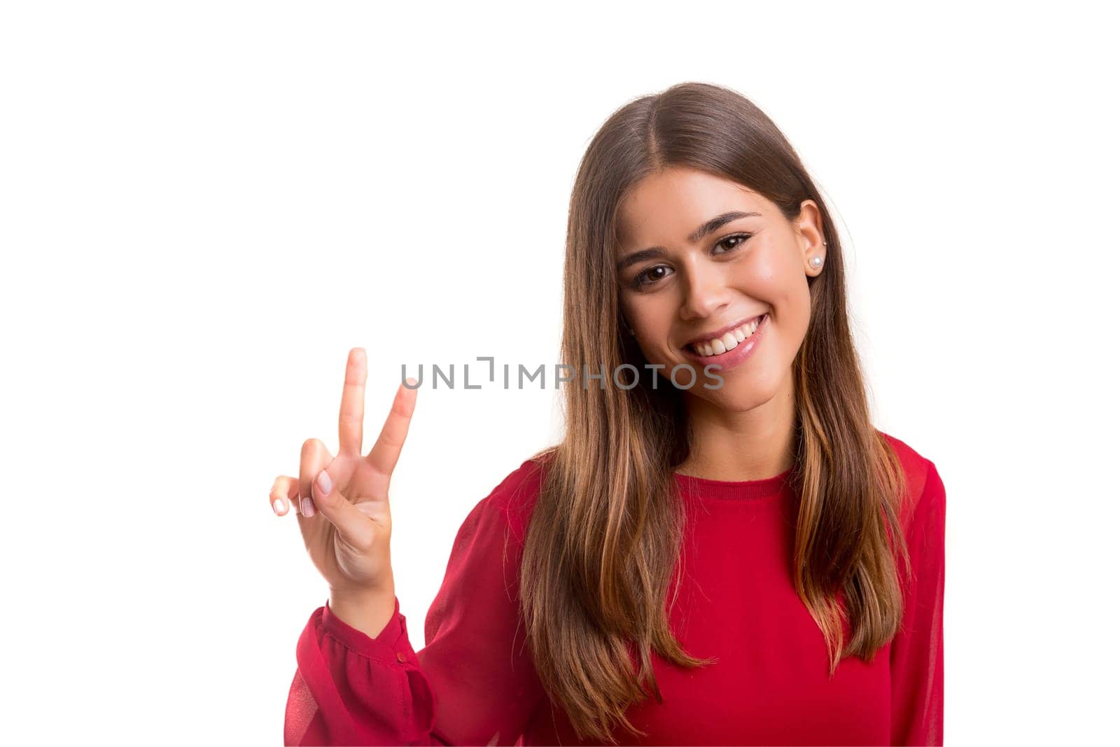 Beautiful young woman signaling ok, isolated over white