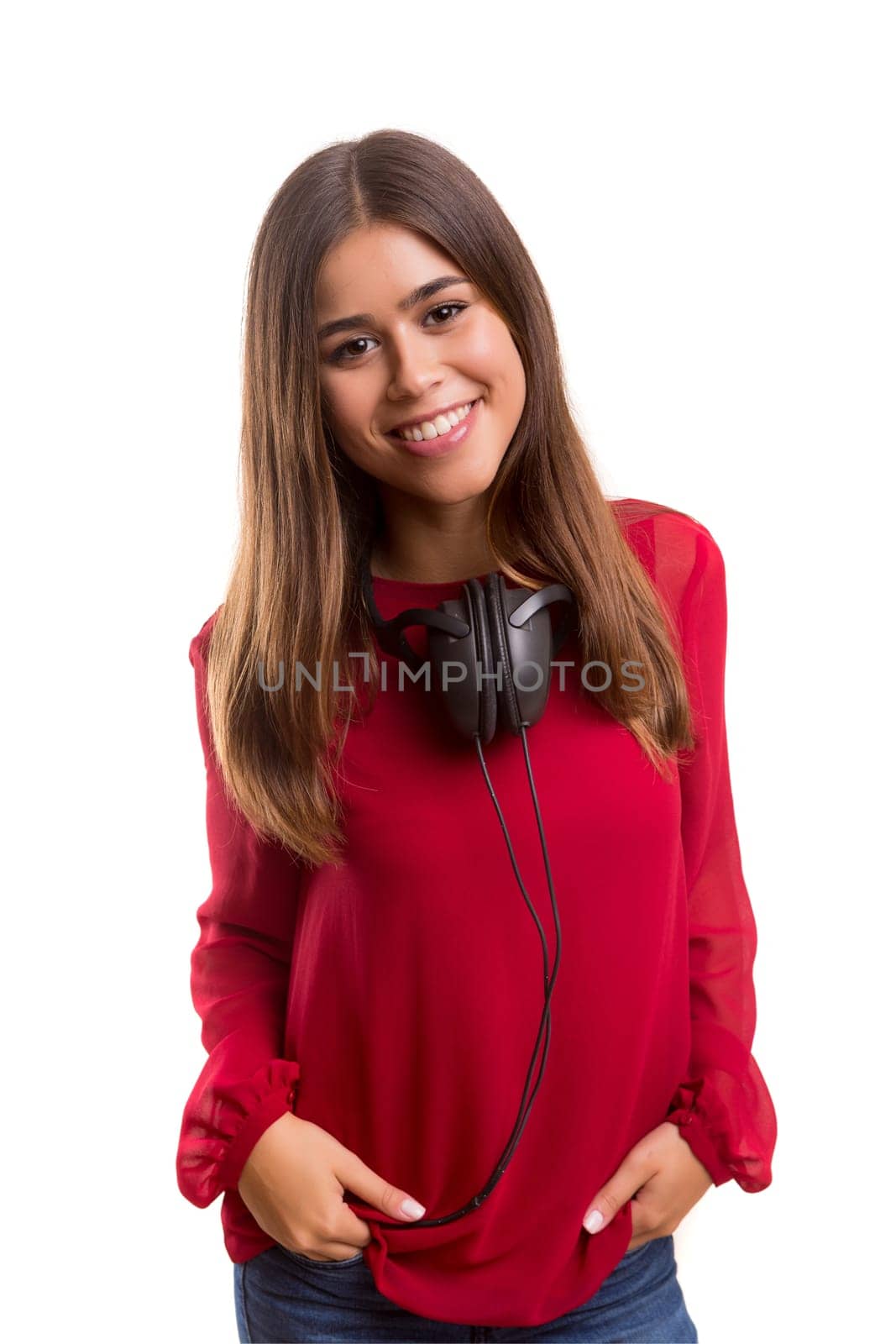 A Happy young woman listening to music