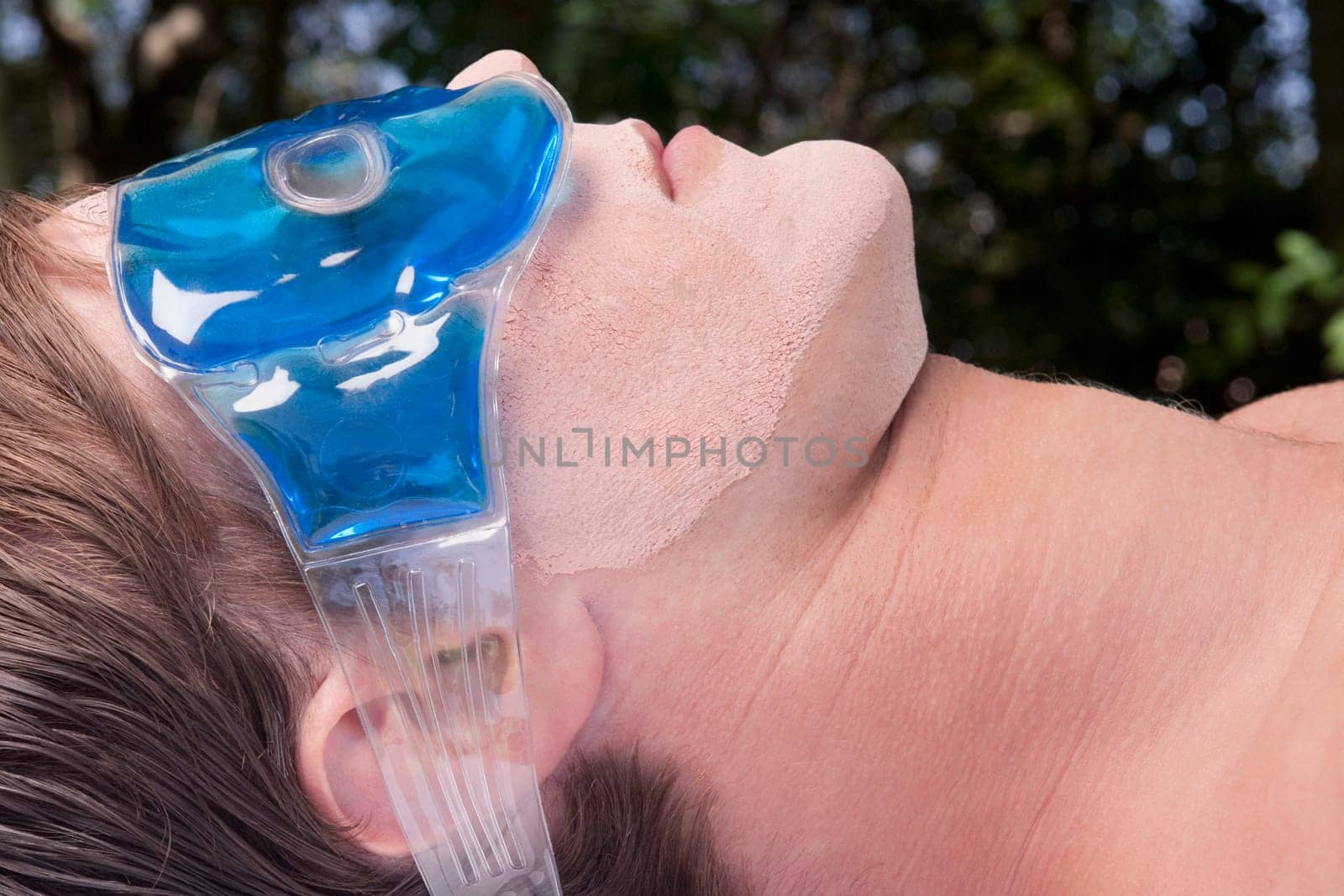 Man wearing eye mask