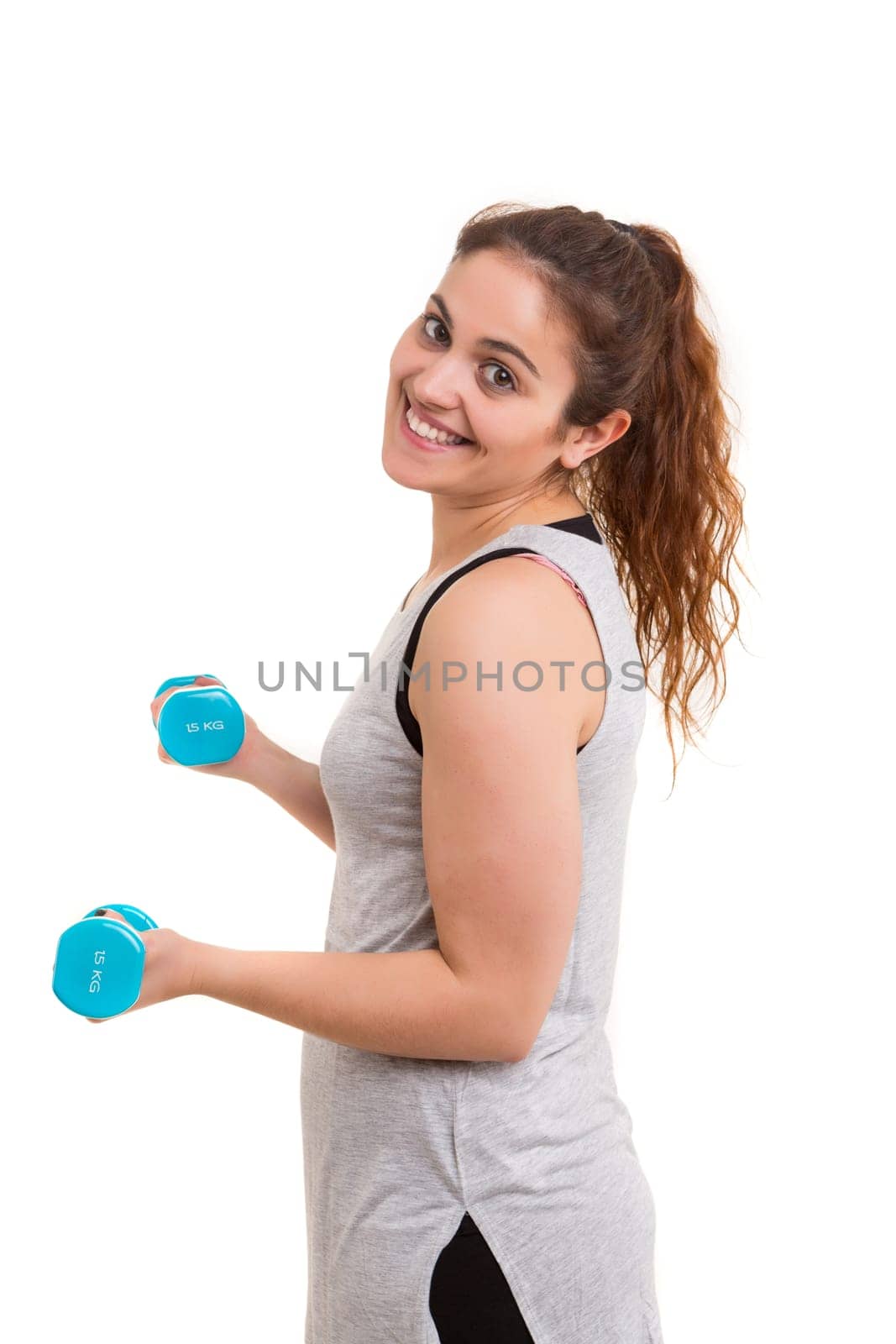 Beautiful large woman exercising - isolated over a white background