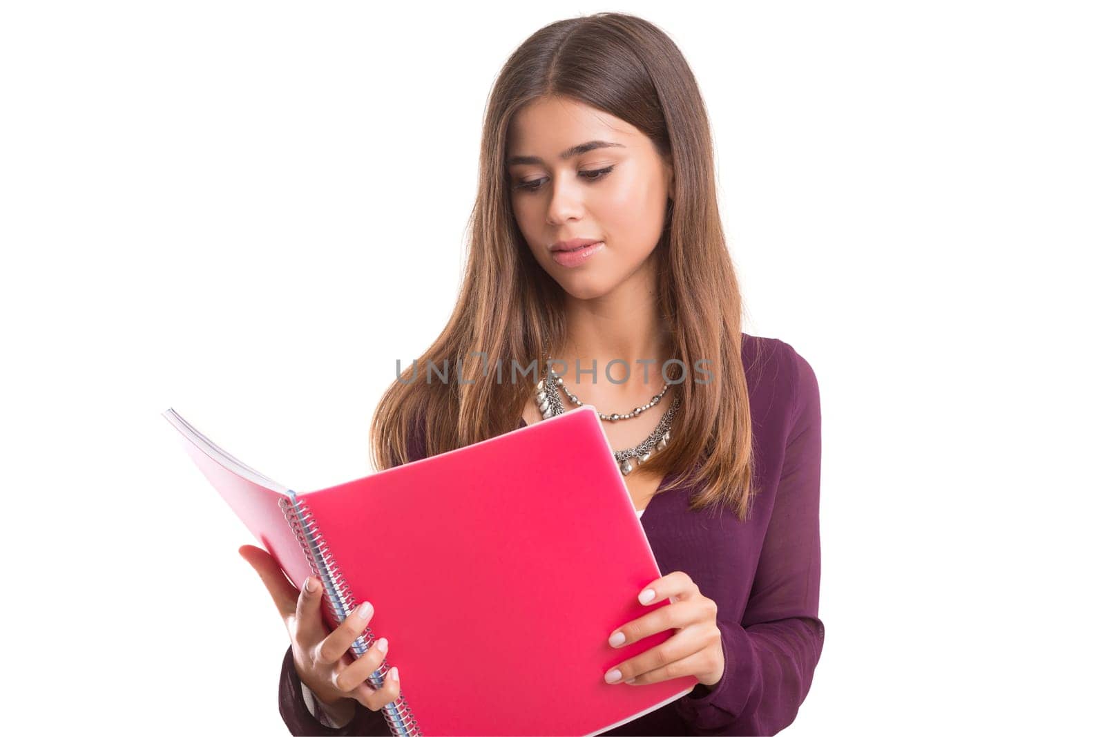 Young student posing over a white background