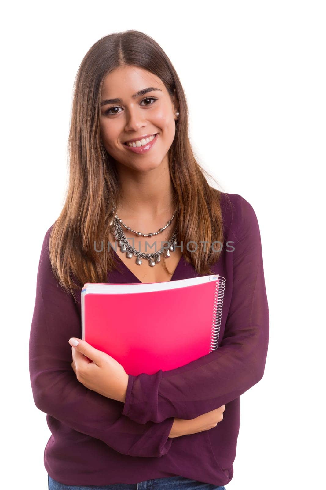 Young student posing over a white background